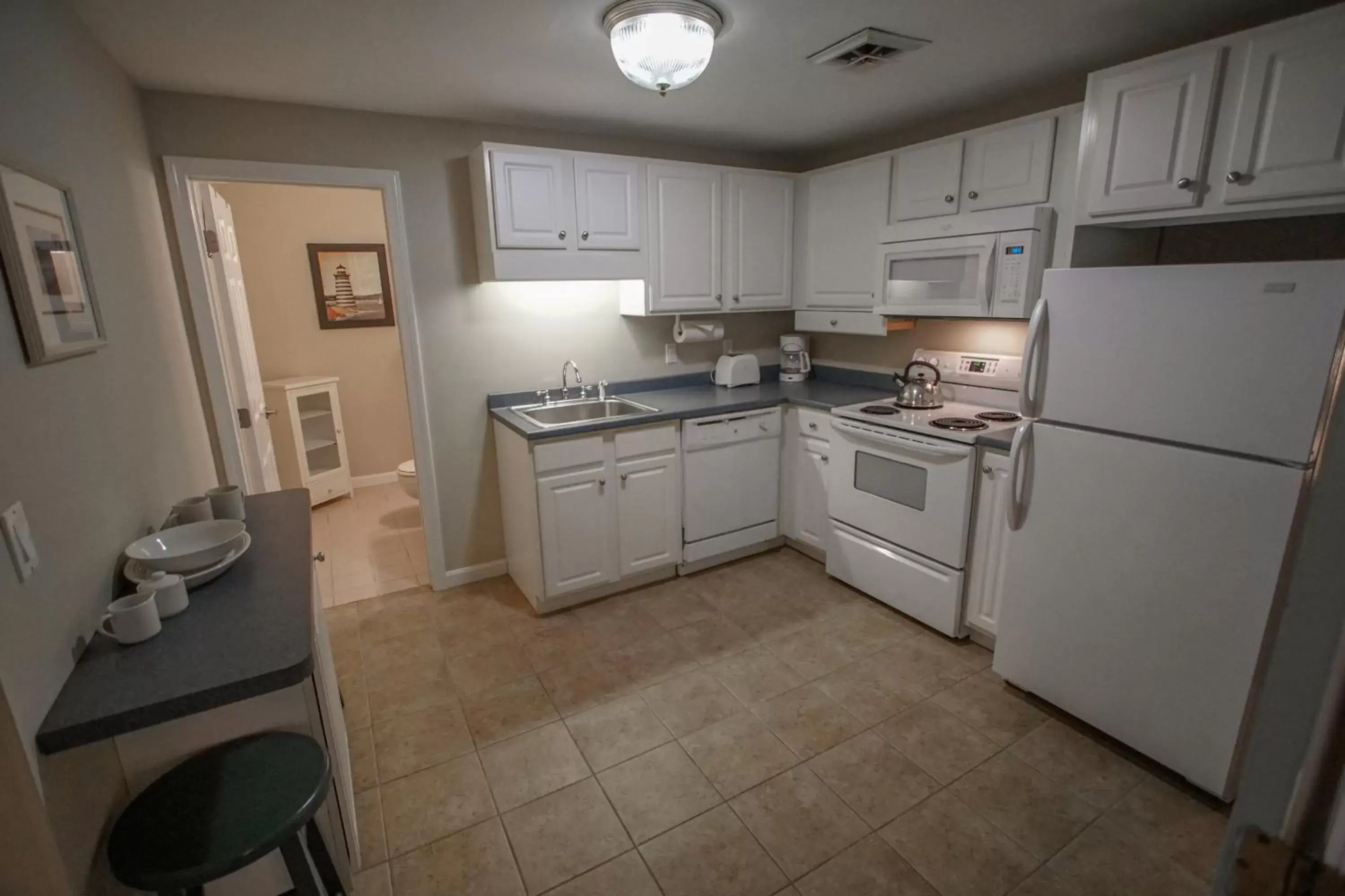 Kitchen/Kitchenette in Cape Winds Resort, a VRI resort