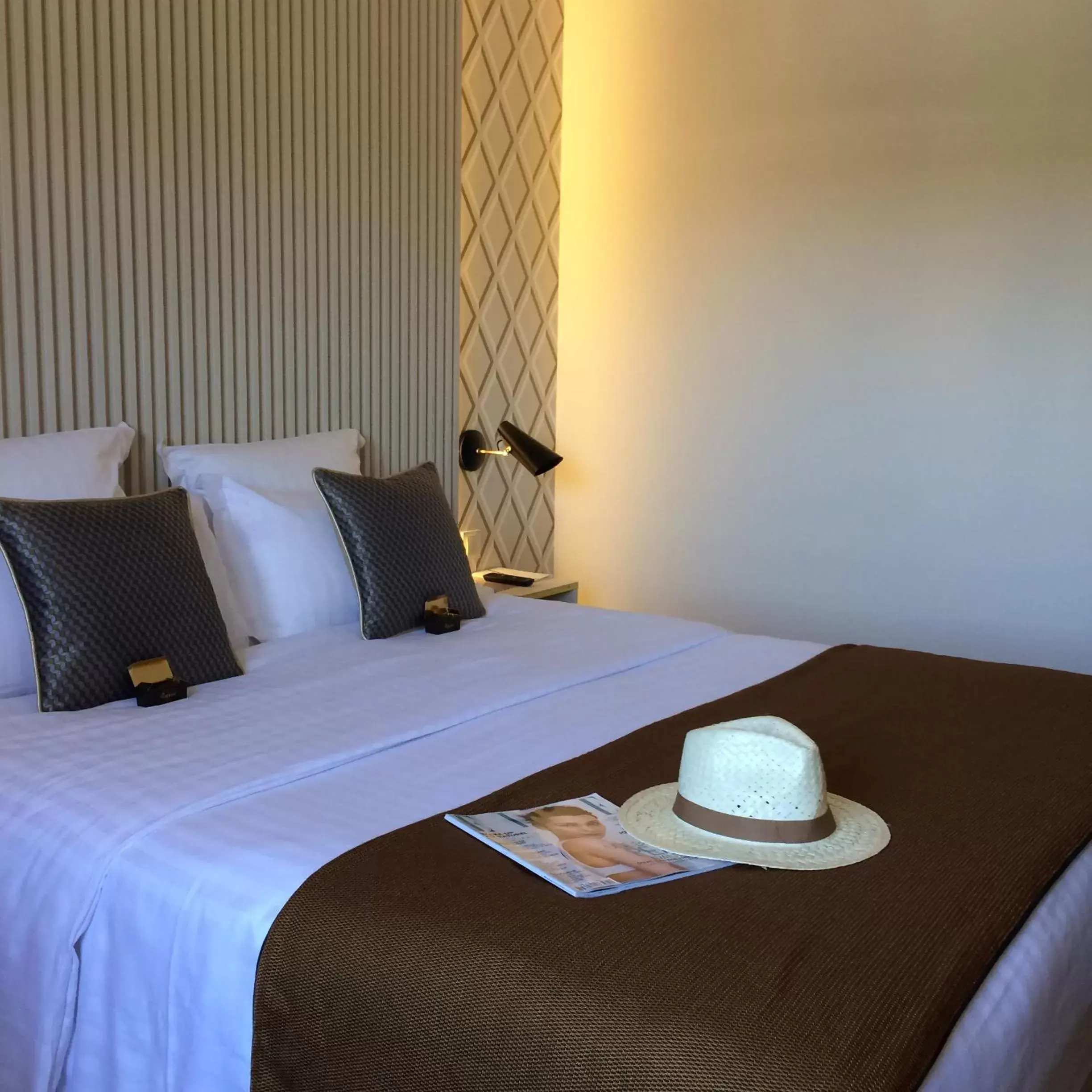 Bed in Aquabella Hôtel & Spa