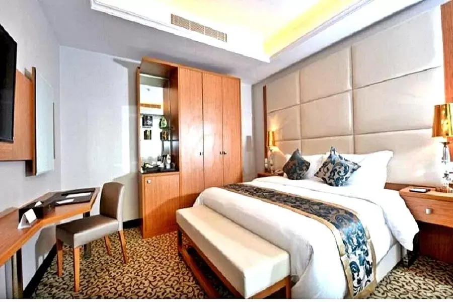 Bed in Grand Park Hotel