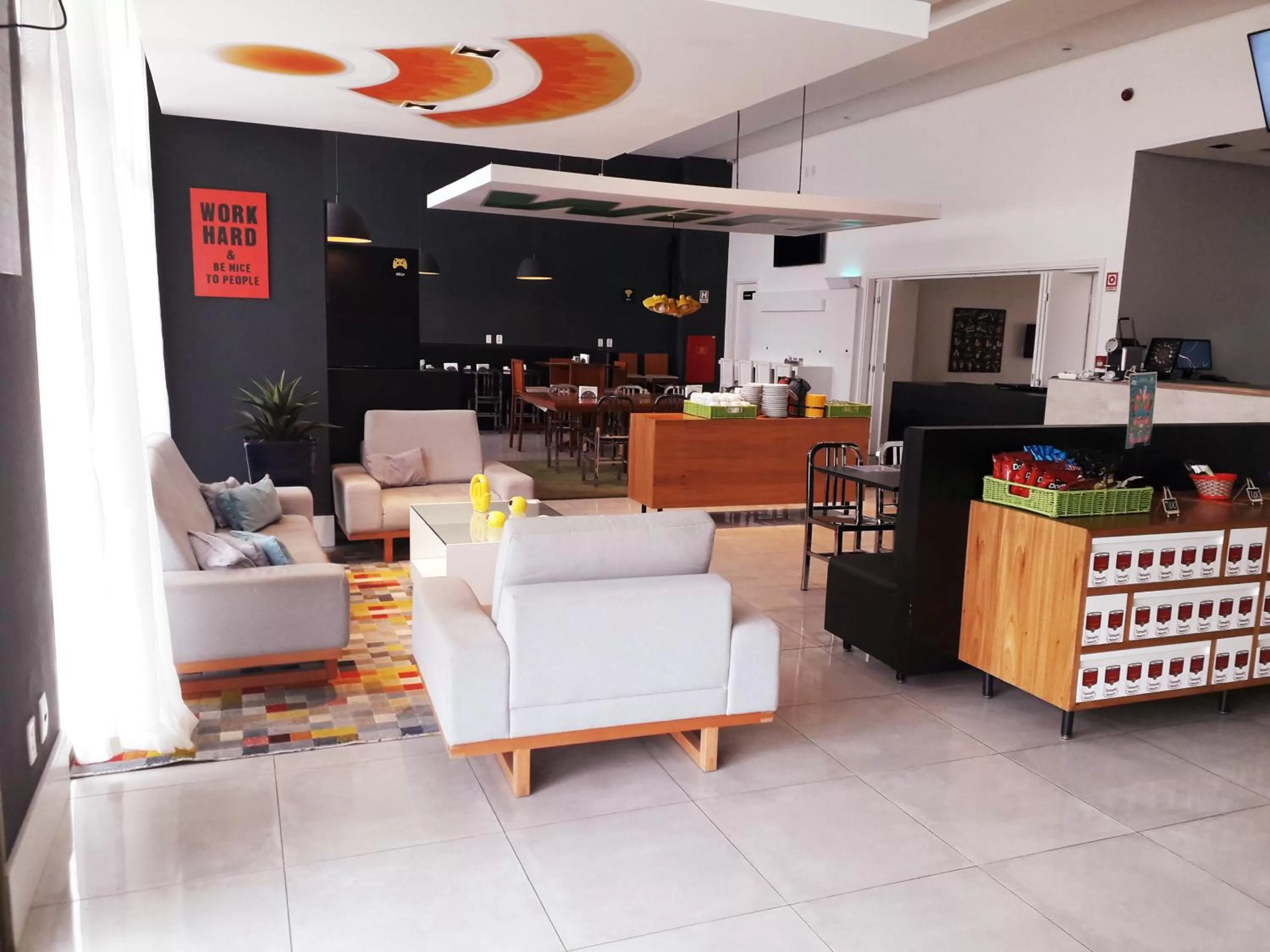 Communal lounge/ TV room in ibis Styles Maracanau