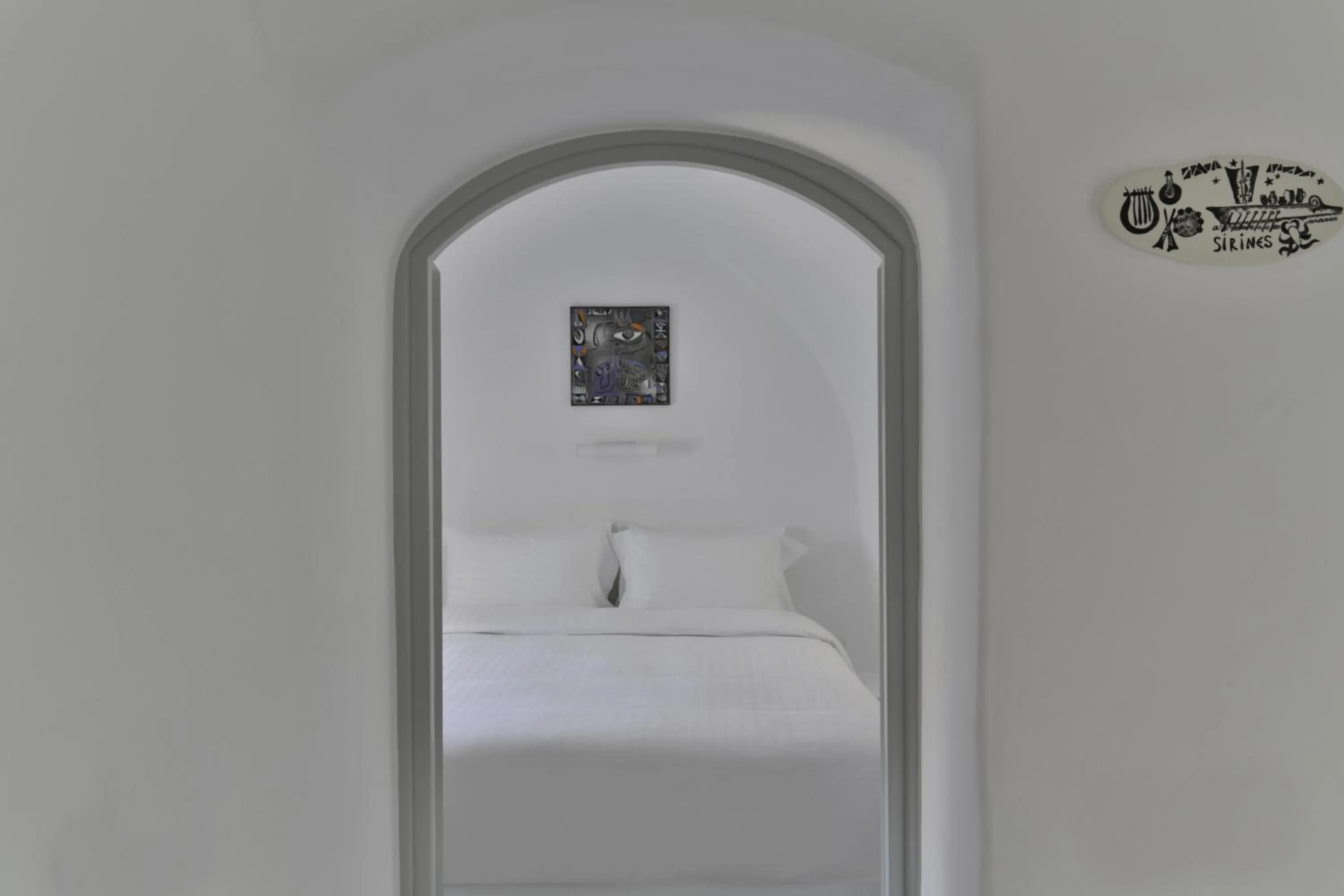 Bed in Trieris Villa & Suites