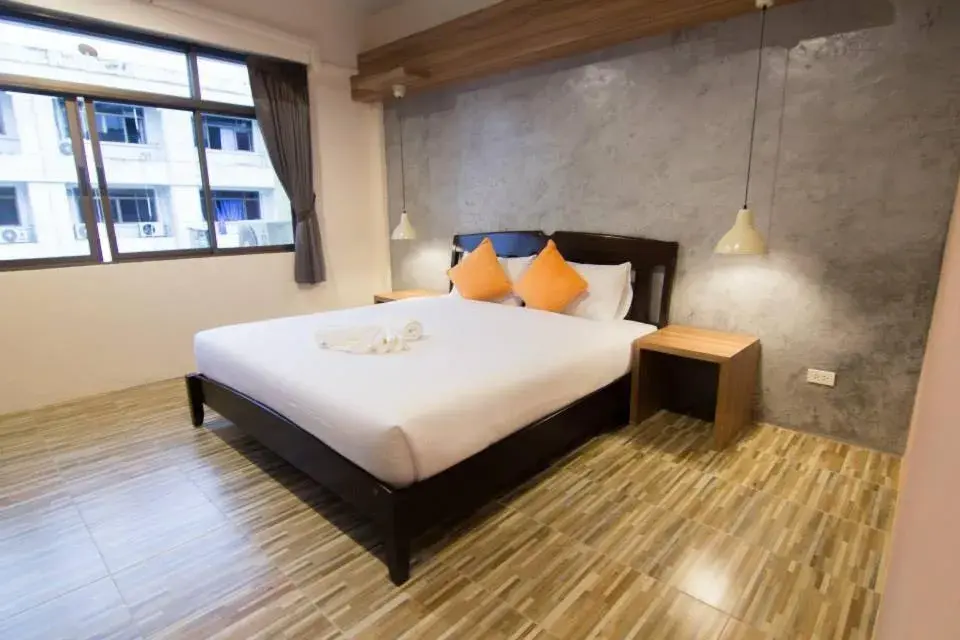 Bed in K.L. Boutique Hotel