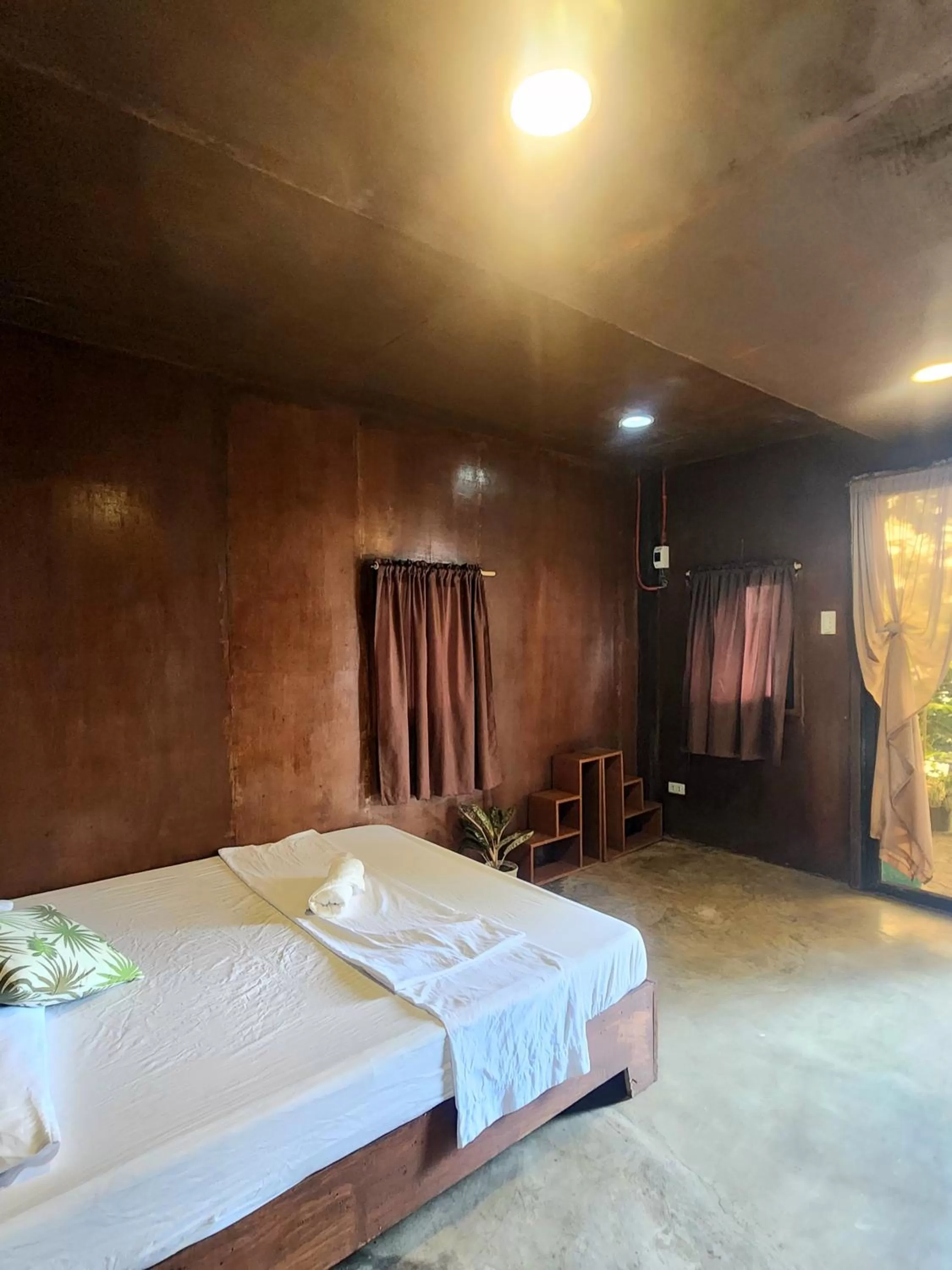 Bed in Cocovana Beach Resort