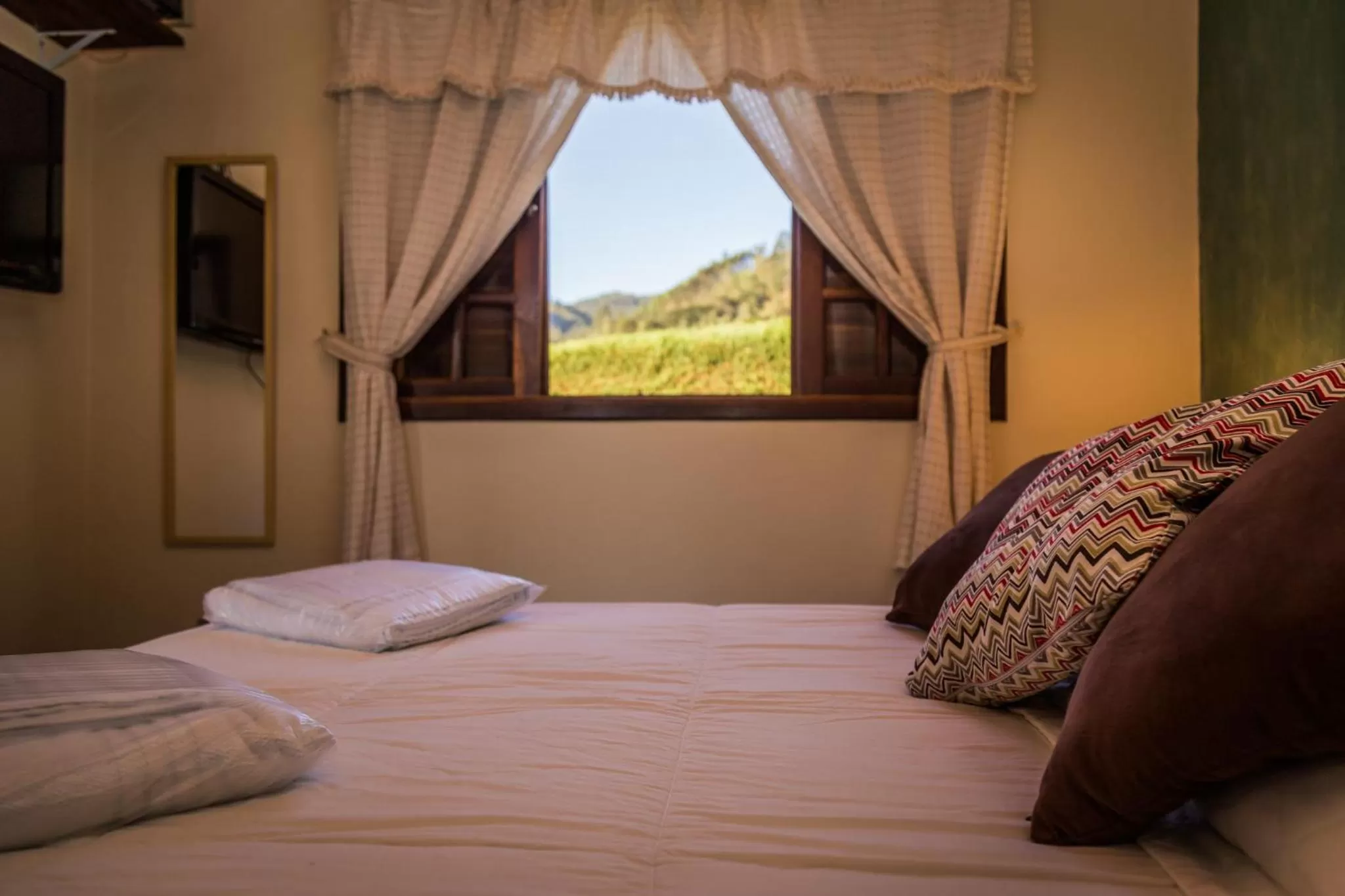 Bed in Pousada Serra do Luar