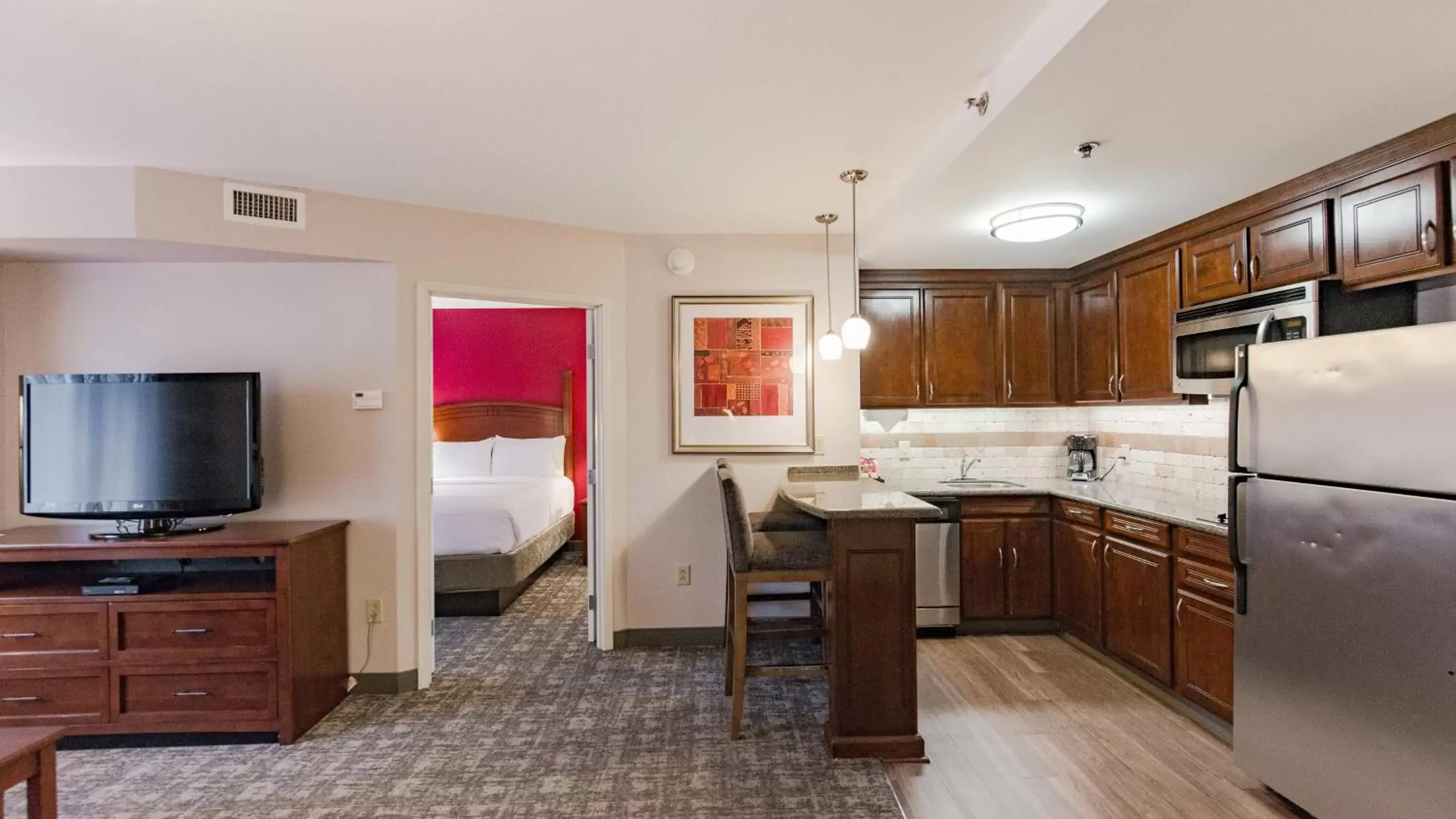 Kitchen/Kitchenette in Staybridge Suites Wilmington East, an IHG Hotel