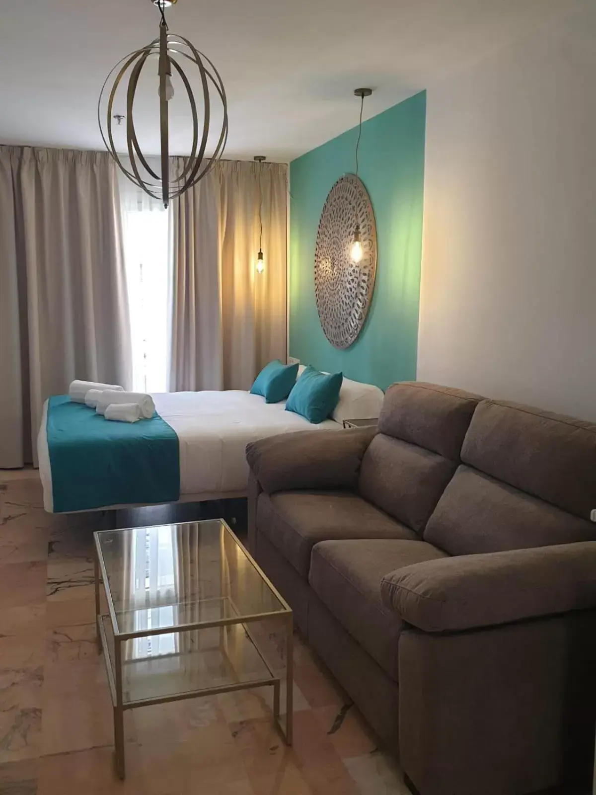 Photo of the whole room in Hotel y Apartamentos Doña Lola