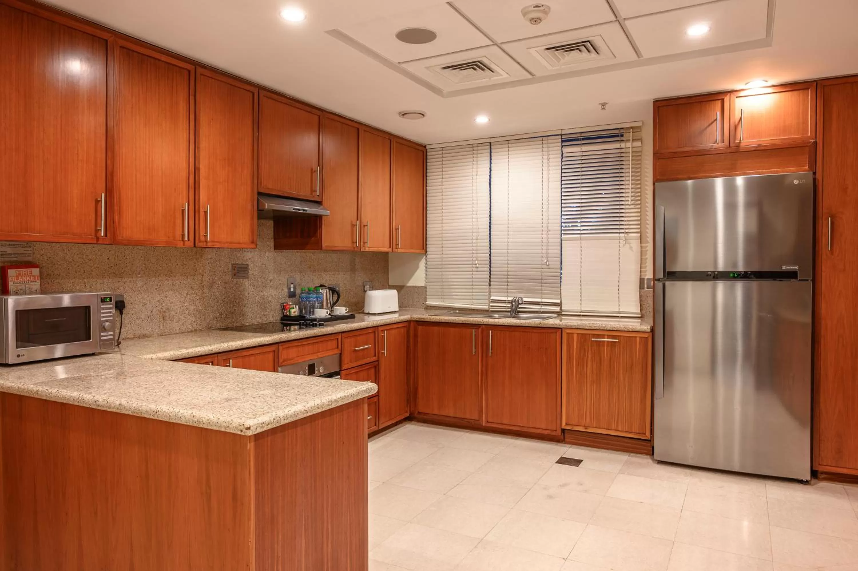 Kitchen or kitchenette in Ramada by Wyndham Downtown Dubai