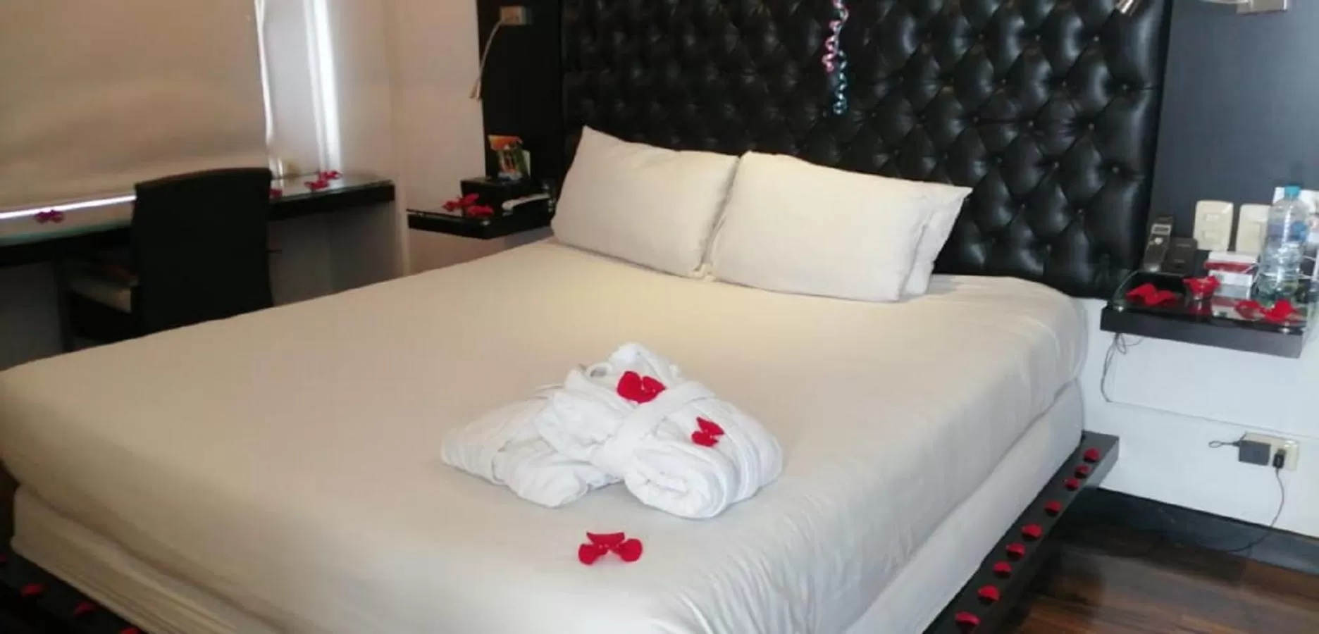 Bed in Hotel 104 Art Suites