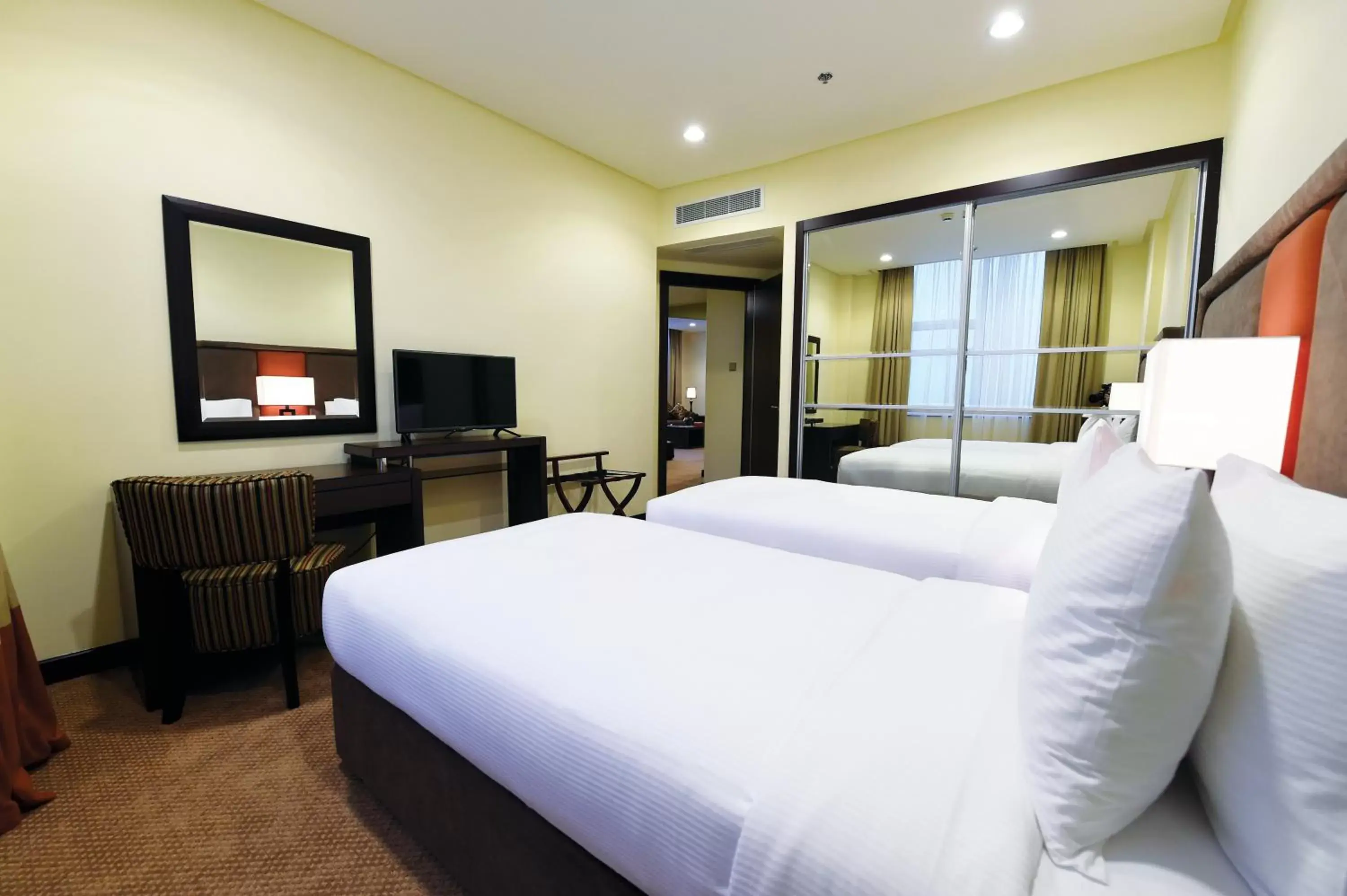 Bed, Room Photo in Orange Suites Hotel