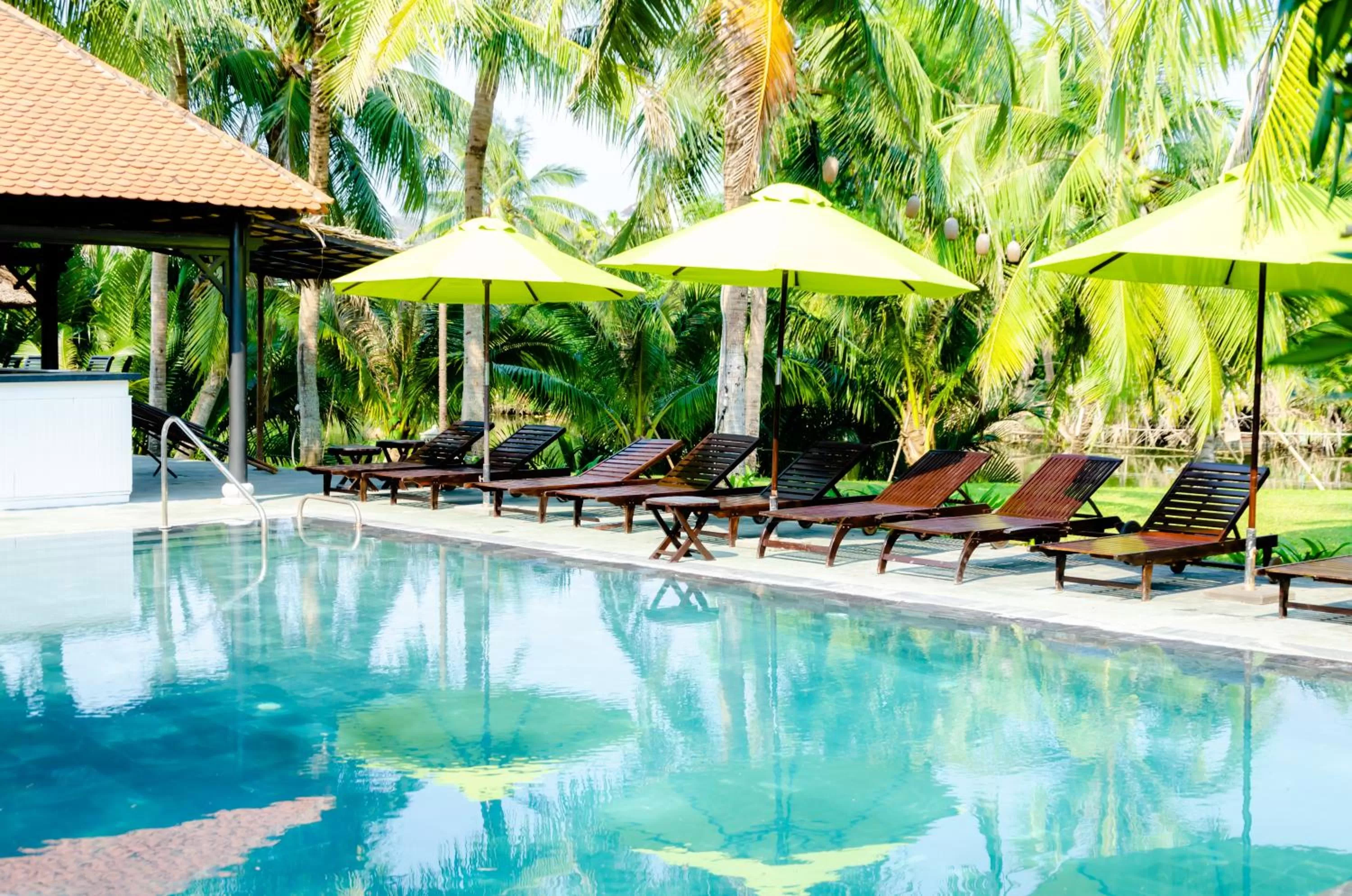 Swimming pool in Riverside Bamboo Resort Hoi An