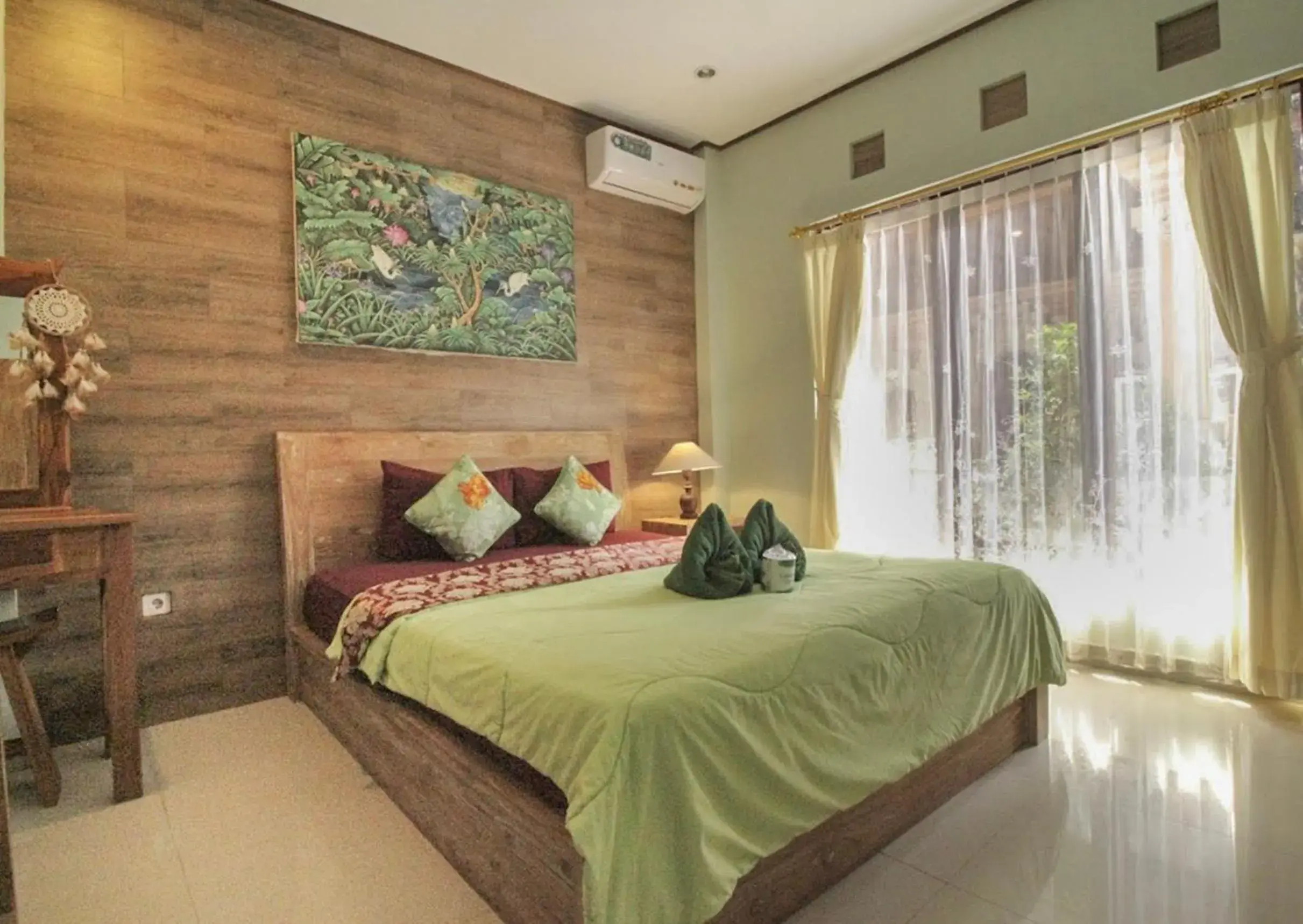 Bed in Aurora House Ubud