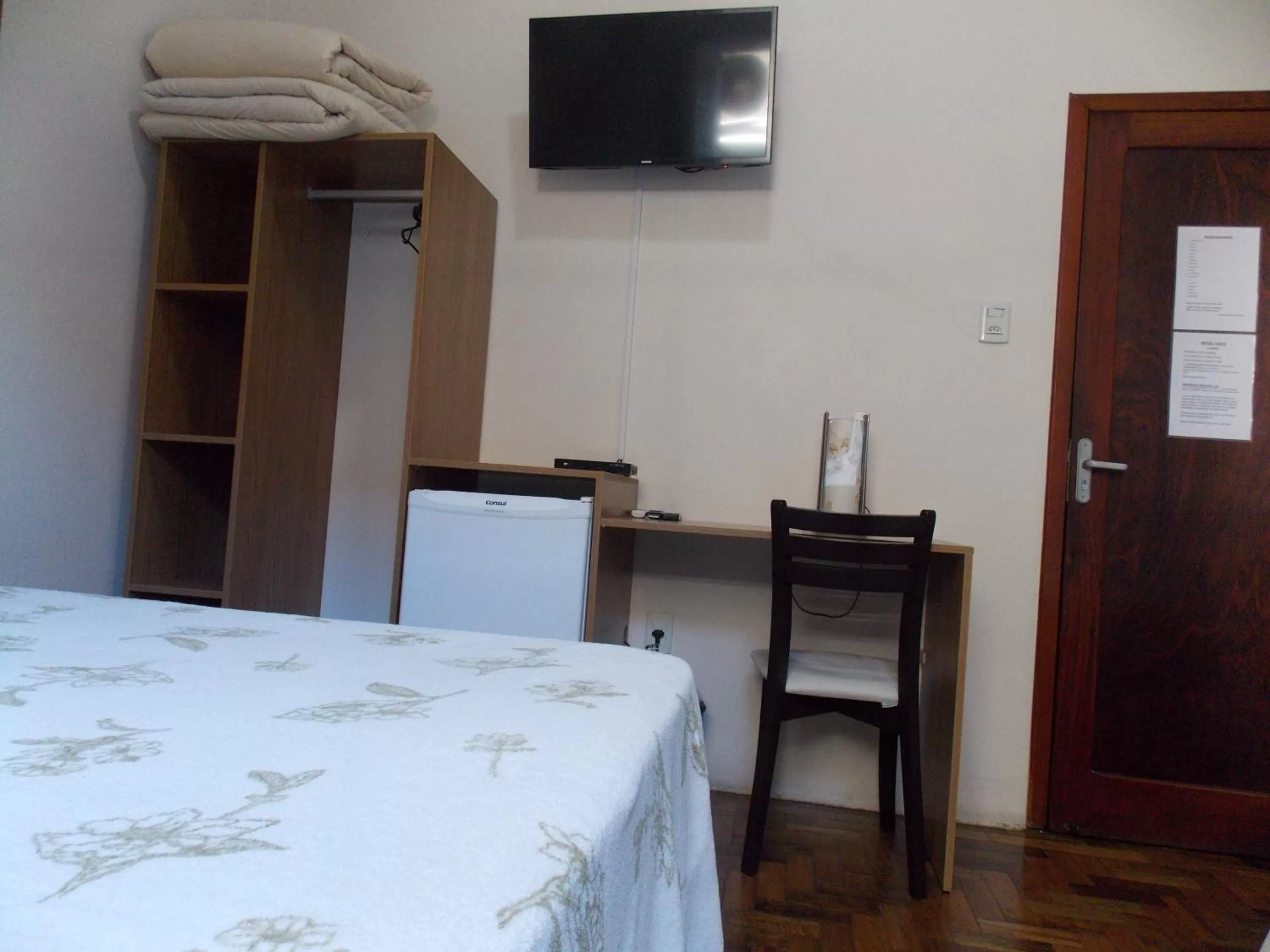 Bedroom, TV/Entertainment Center in Hotel Visão