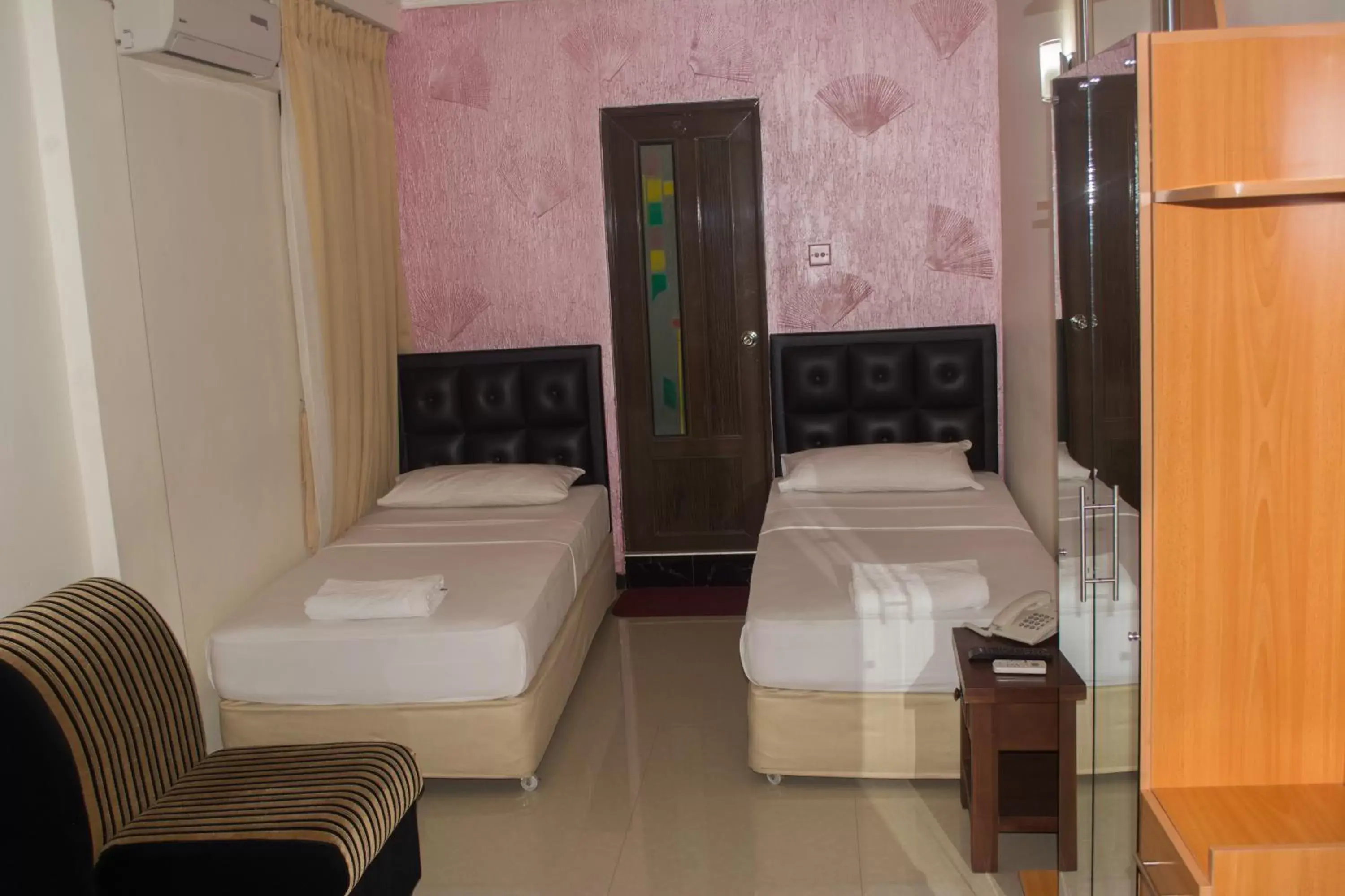 Photo of the whole room, Bed in Saasha City Hotel