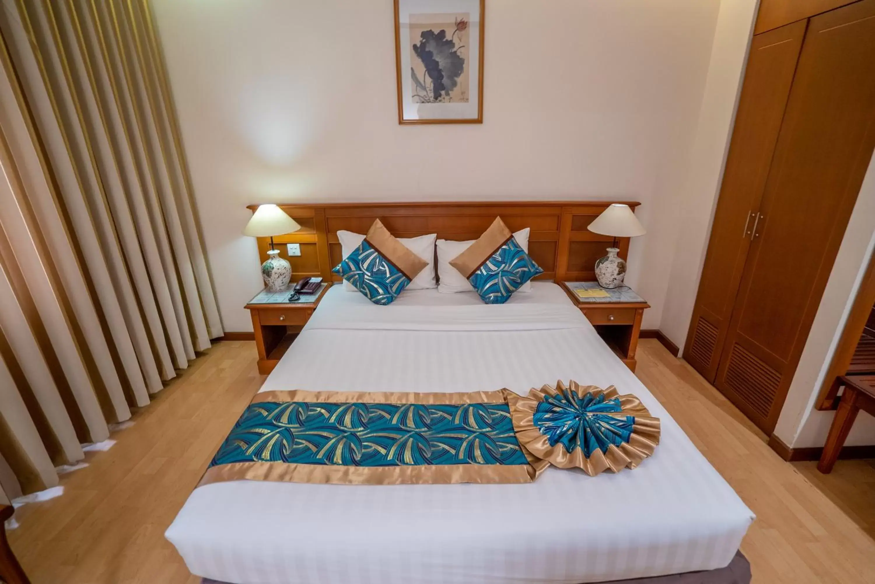 Bed in Oscar Saigon Hotel