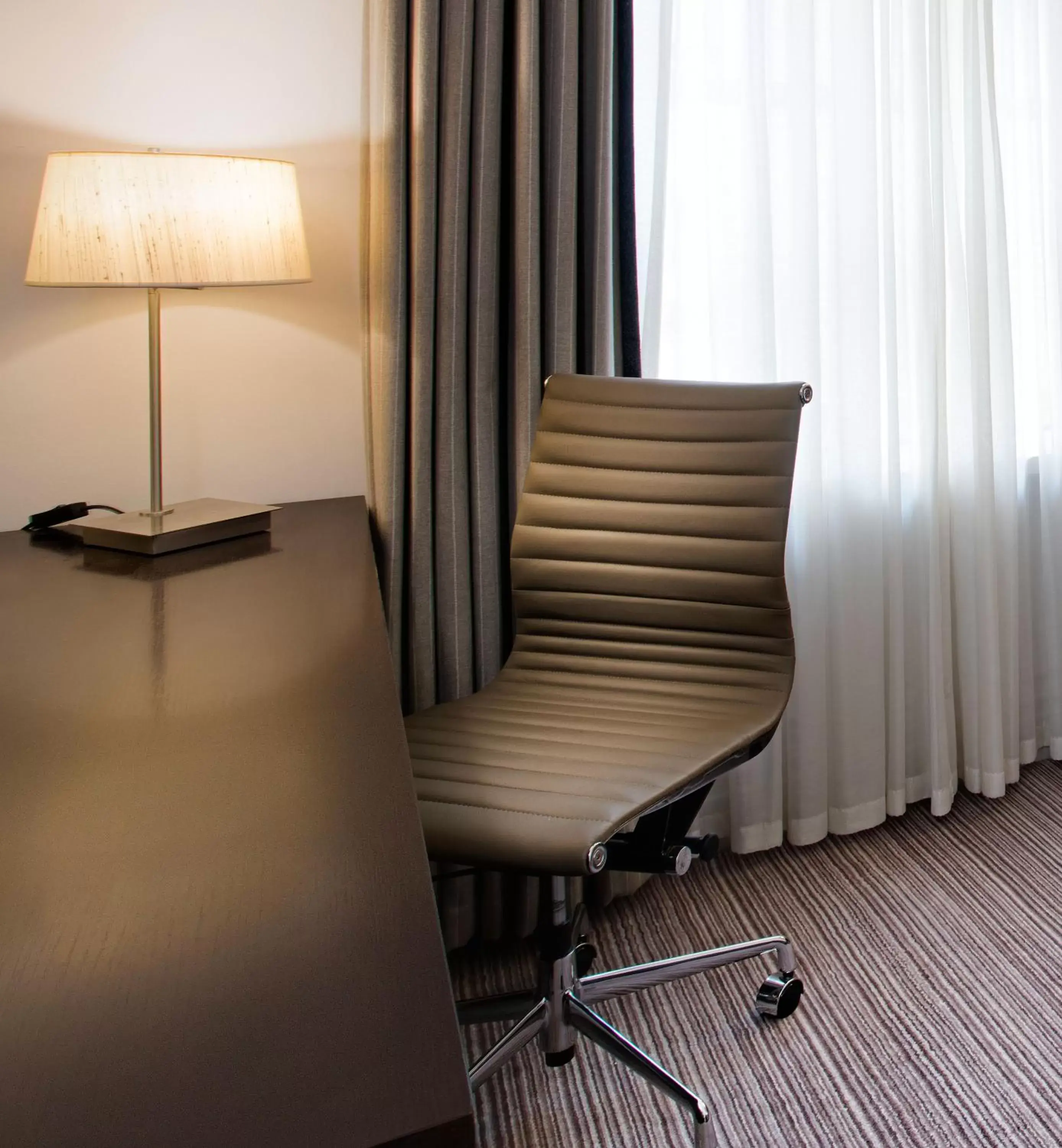 Bedroom, Seating Area in Leonardo Hotel Cardiff - Formerly Jurys Inn