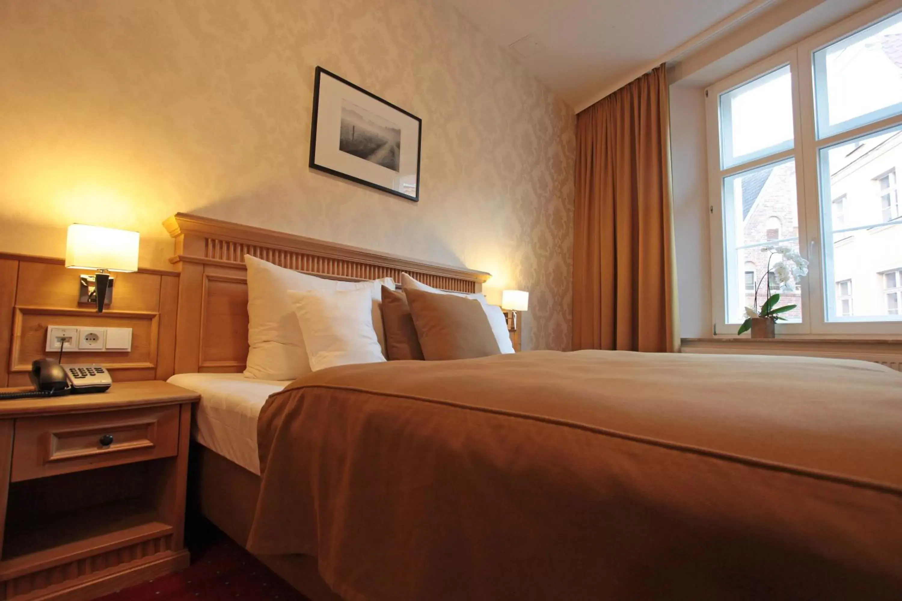Bed in Romantik Hotel Scheelehof Stralsund