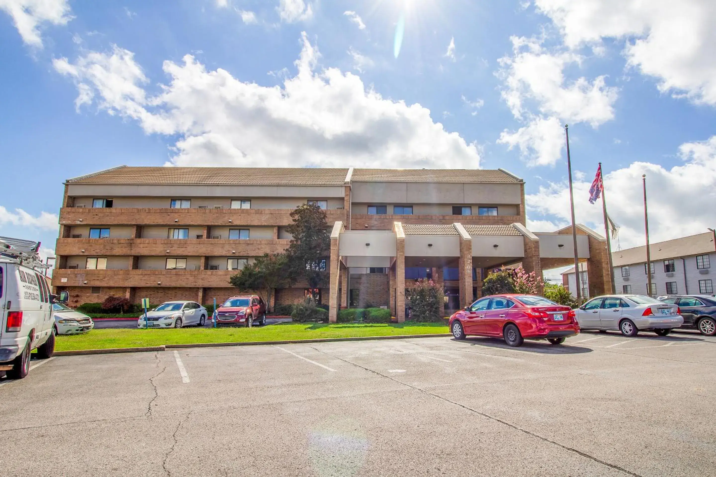 Parking, Property Building in Tulsa Square Hotel Central, I-44 By OYO