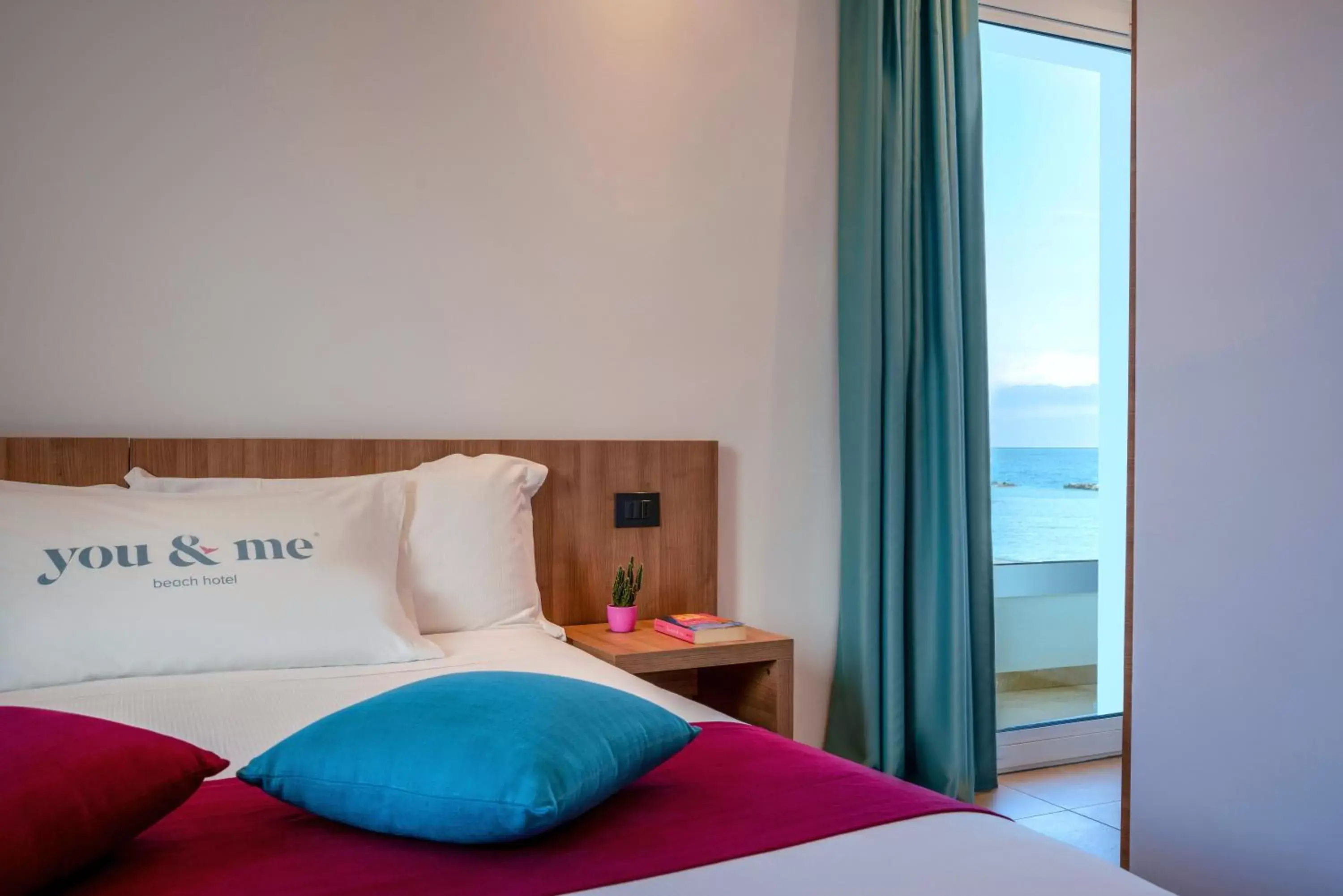 Bed in You & Me Beach Hotel