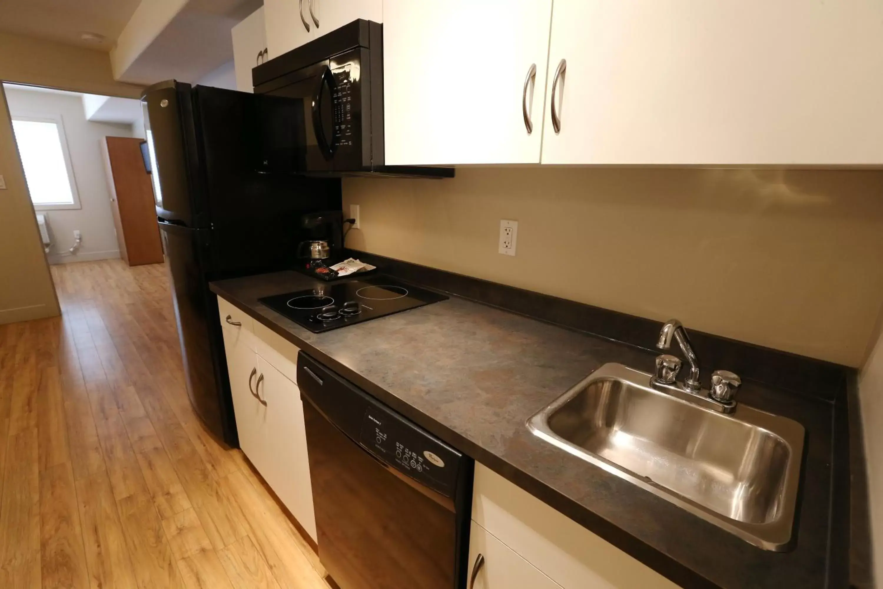 Kitchen or kitchenette, Kitchen/Kitchenette in Baymont by Wyndham Fort McMurray