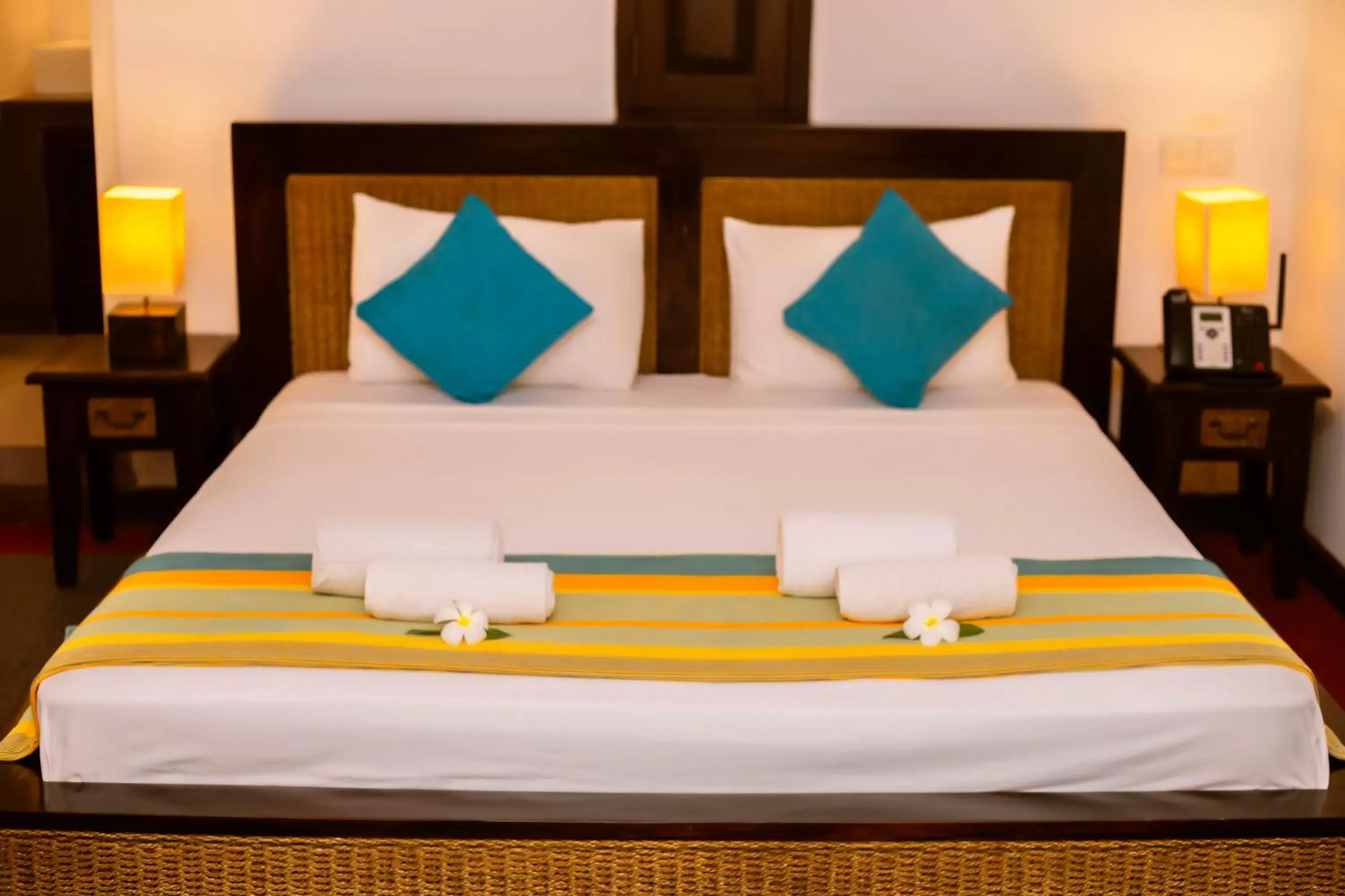 Bed in St.Lachlan Hotel & Suites