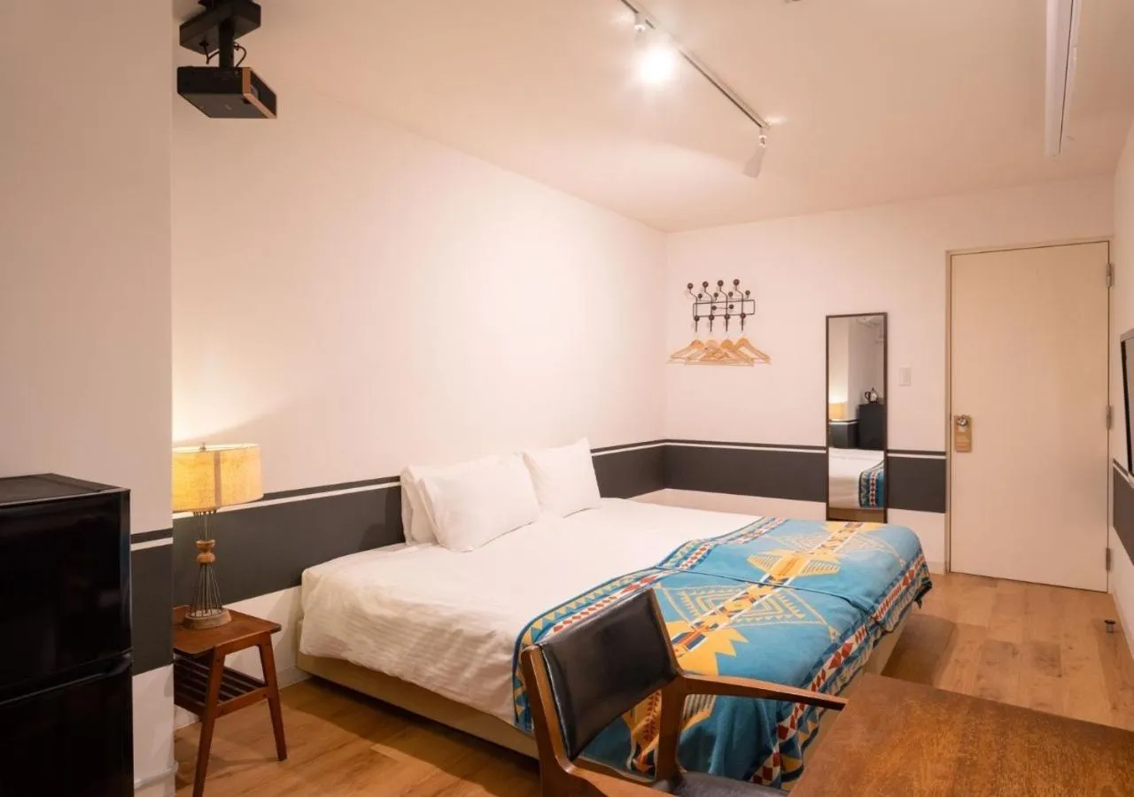 TV and multimedia, Bed in Hotel Graphy Nezu