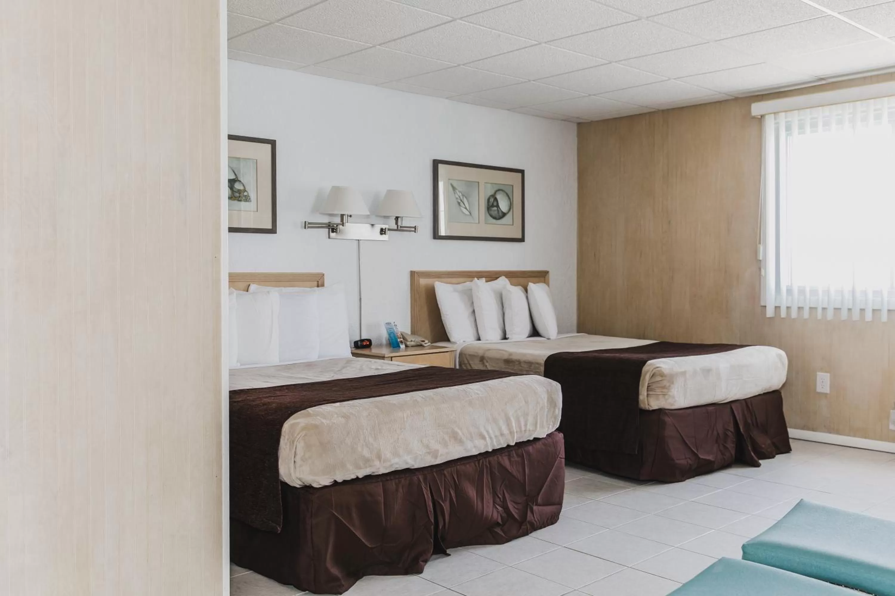 Bed in Heart of Wildwood Boardwalk Motel