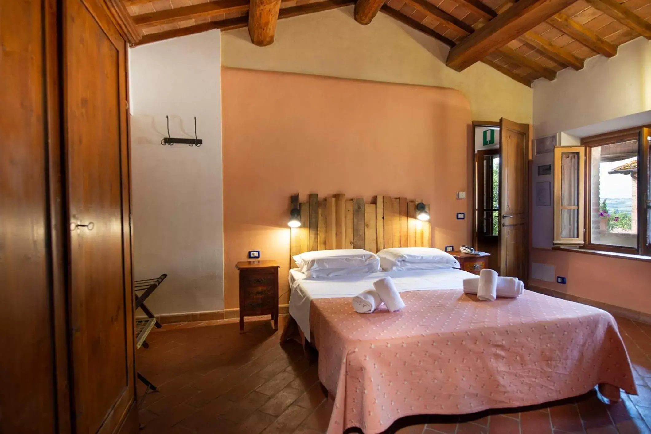 Photo of the whole room, Bed in Locanda Vesuna