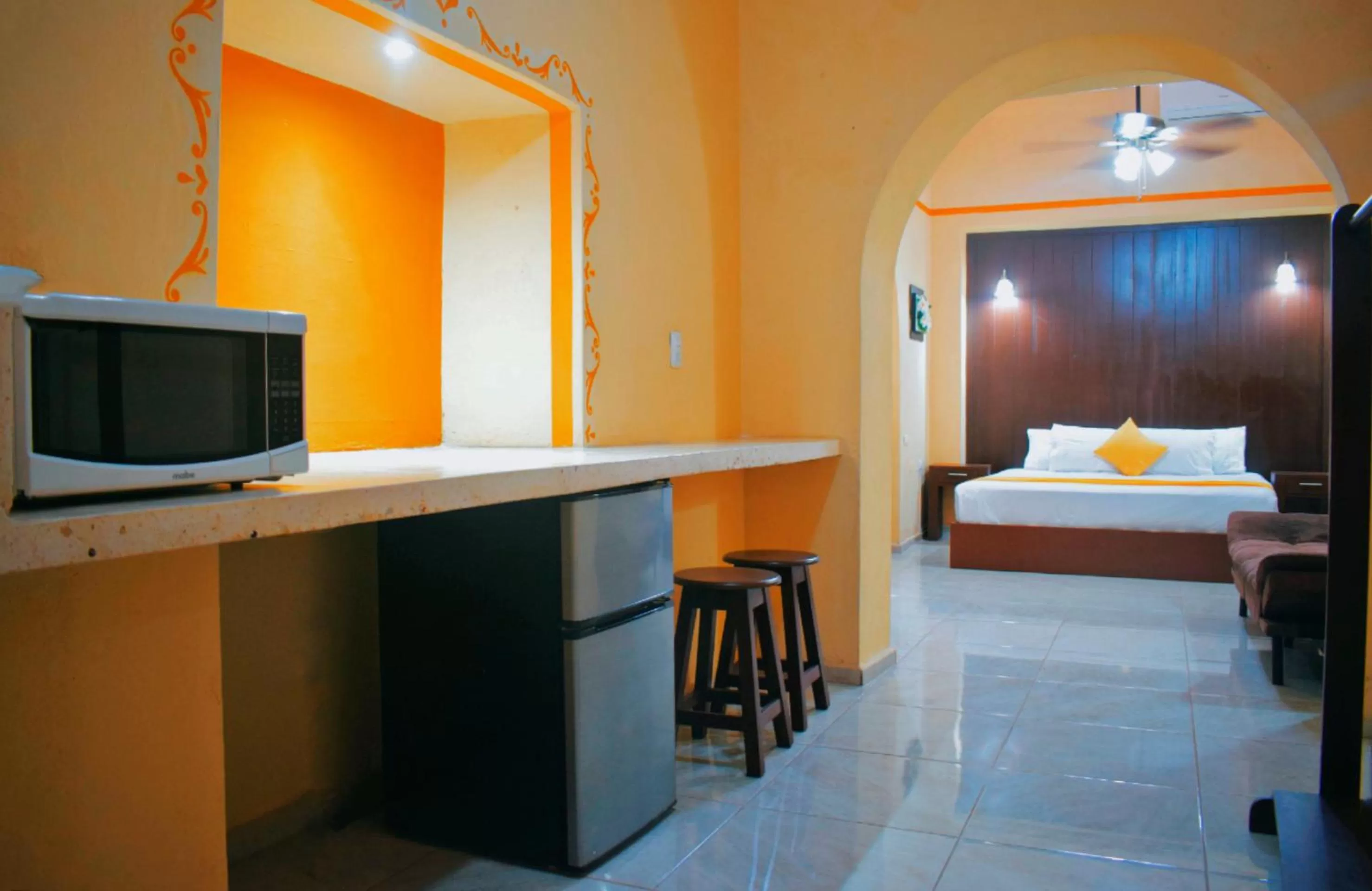 Communal lounge/ TV room, Bed in Hotel Casa Rico