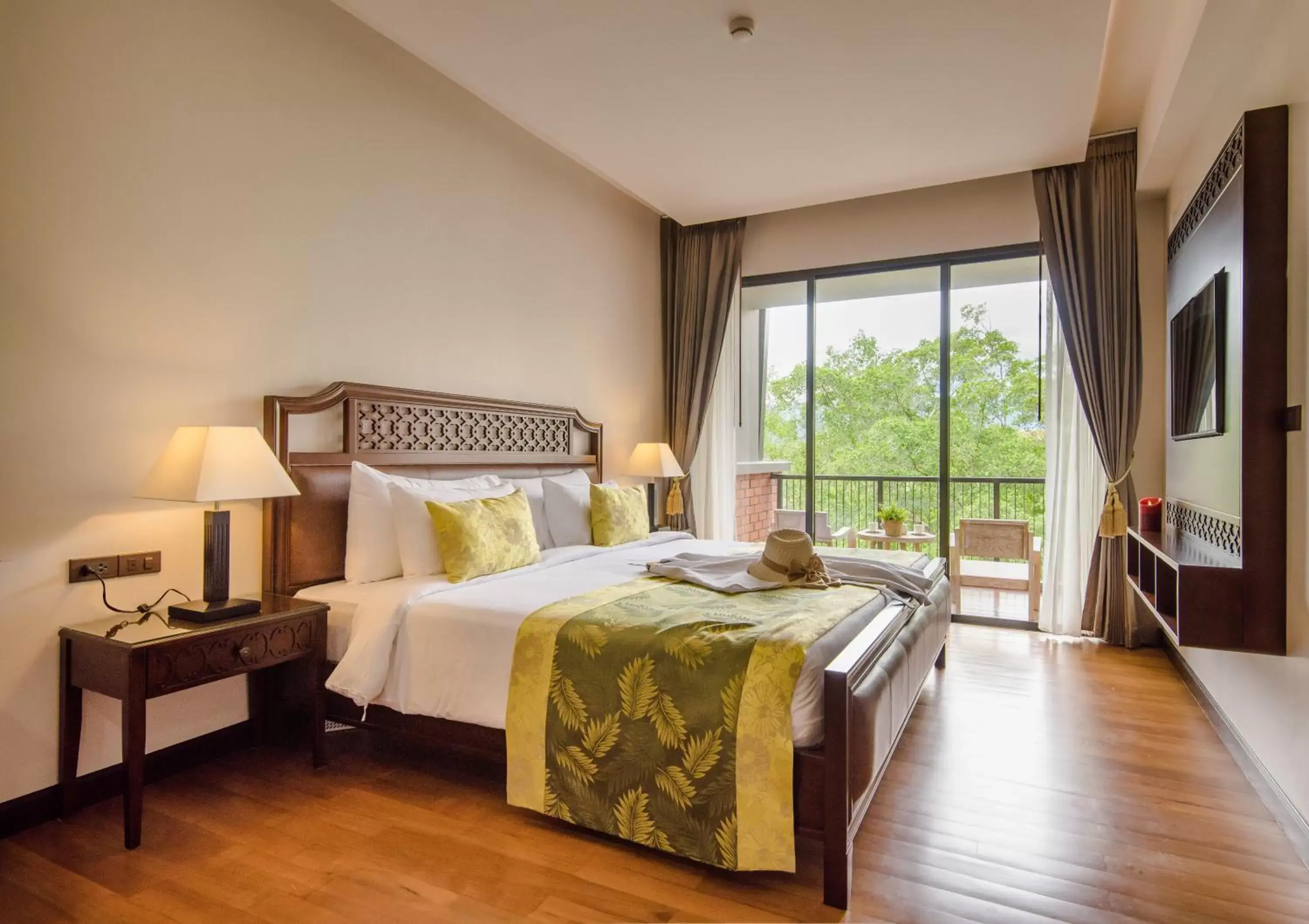 Bed in Rimnaam Klangchan Hotel - SHA Plus