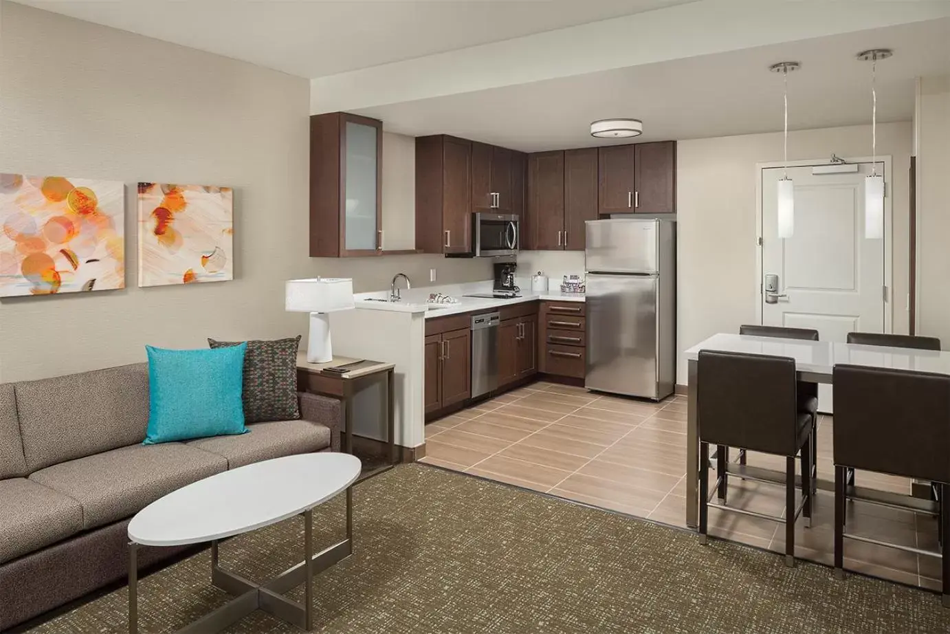 Living room, Kitchen/Kitchenette in Residence Inn by Marriott Ontario Rancho Cucamonga