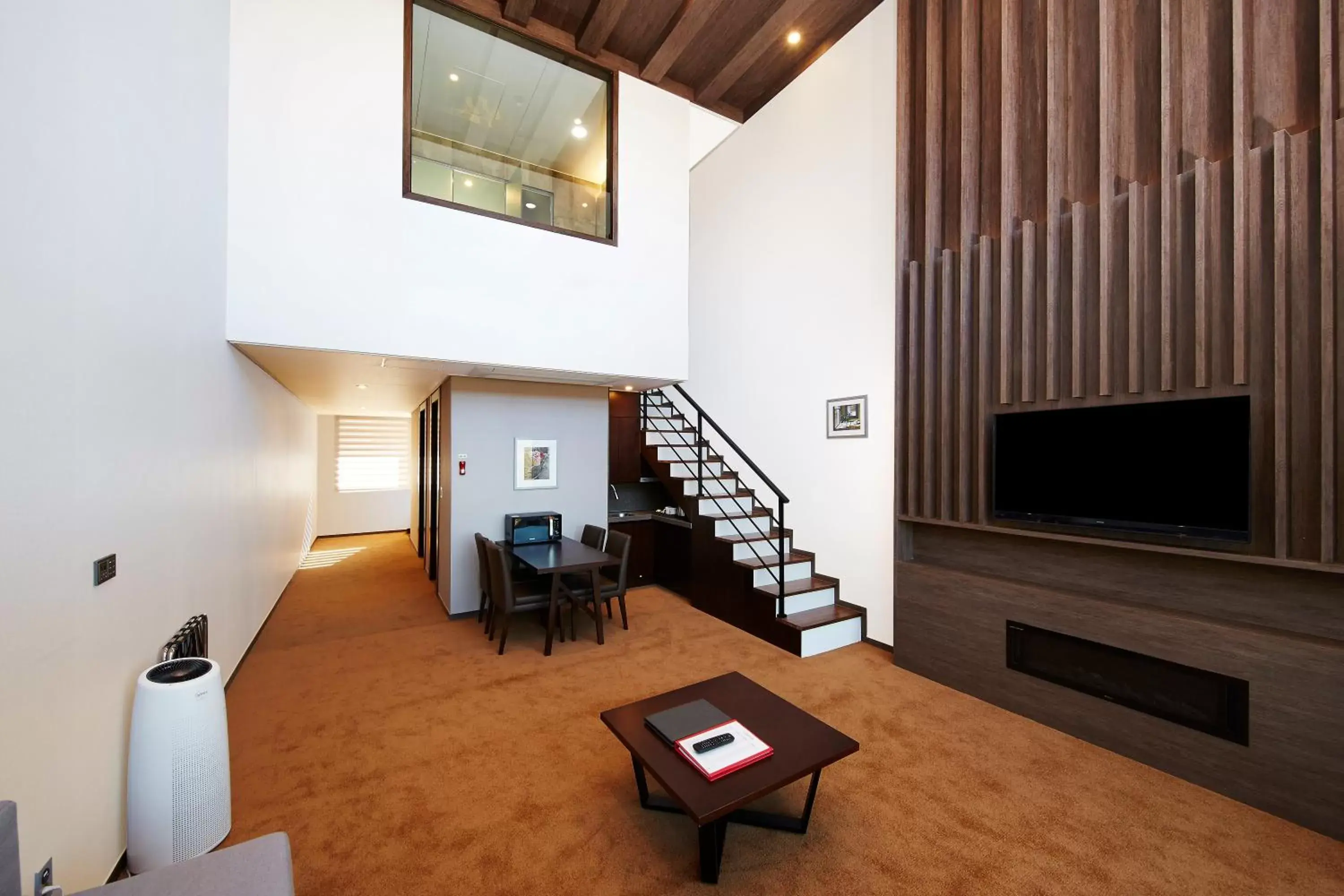 Living room, TV/Entertainment Center in Pyeongchang Ramada Hotel & Suite by Wyndham