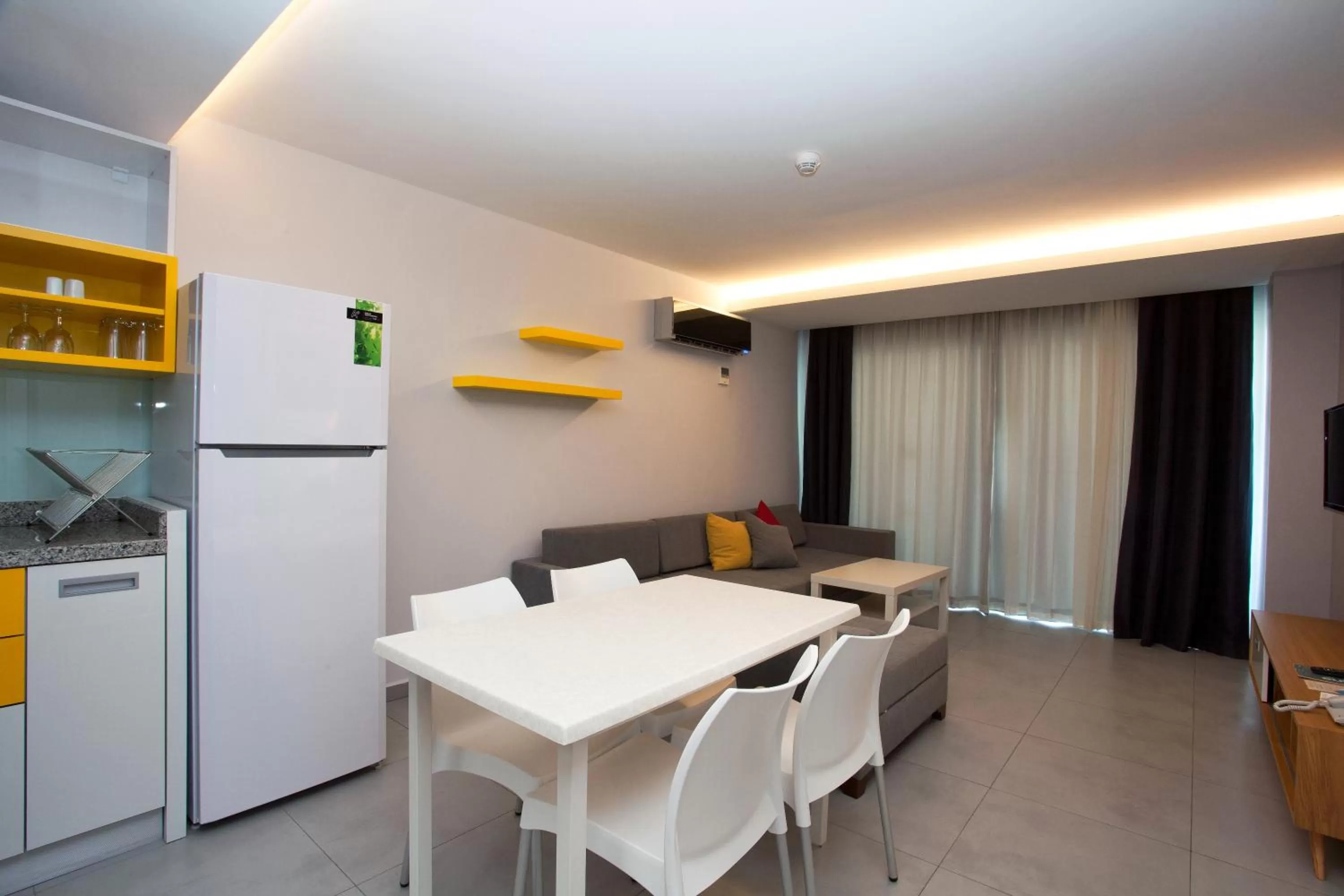 Kitchen or kitchenette in Green Garden Suites Hotel