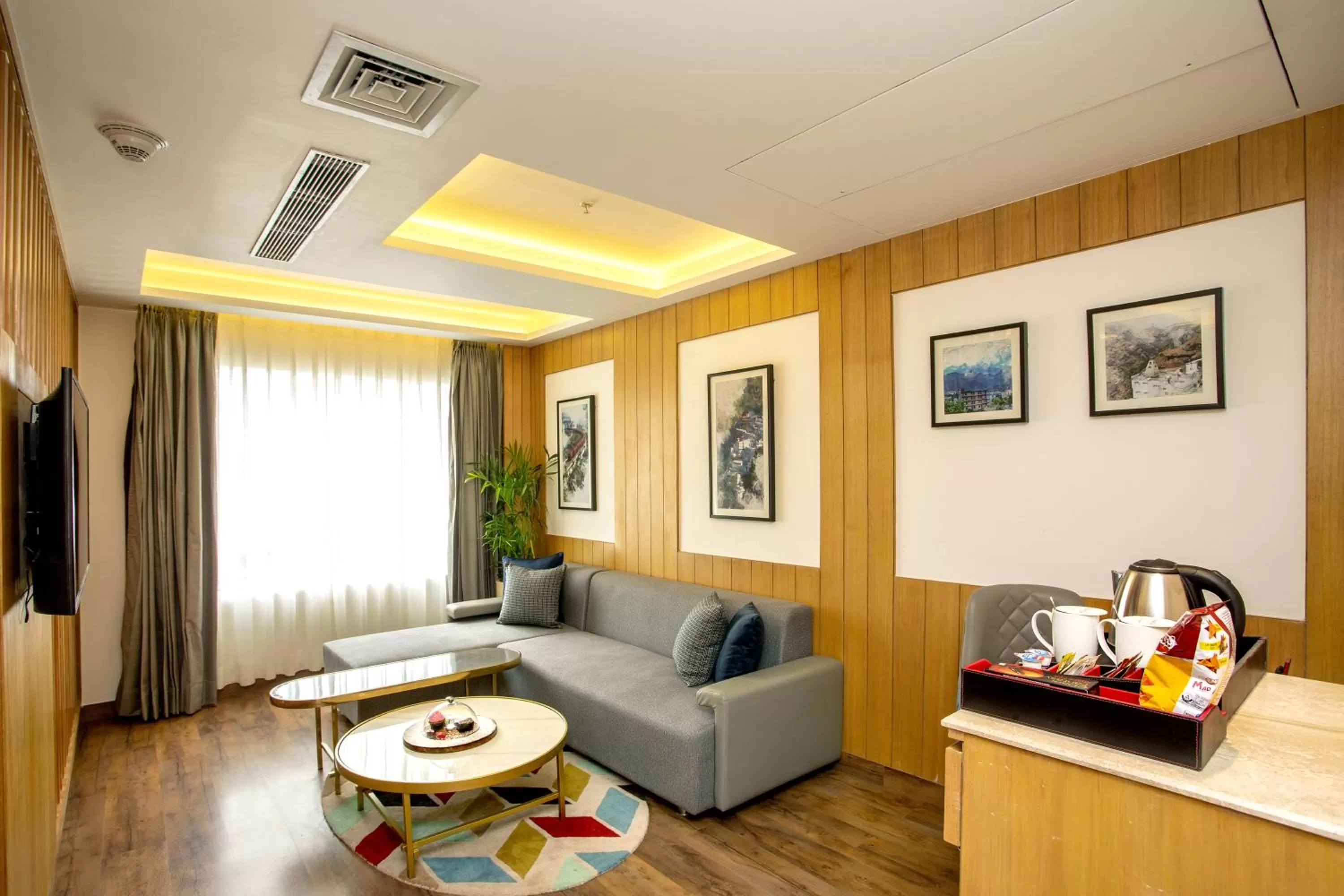 Living room in Ramada by Wyndham Katra Station Road