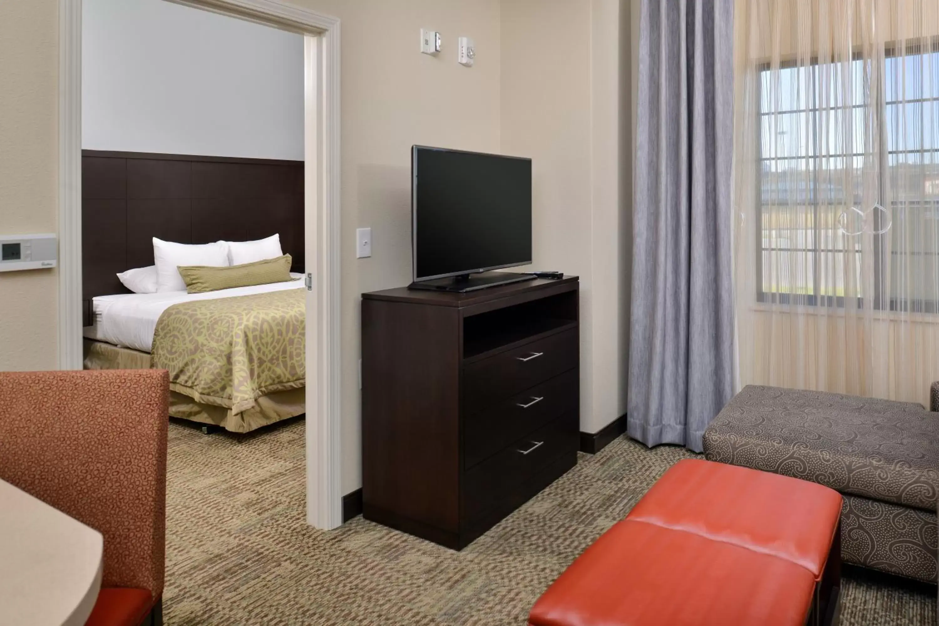 Photo of the whole room, TV/Entertainment Center in Staybridge Suites Rochester, an IHG Hotel