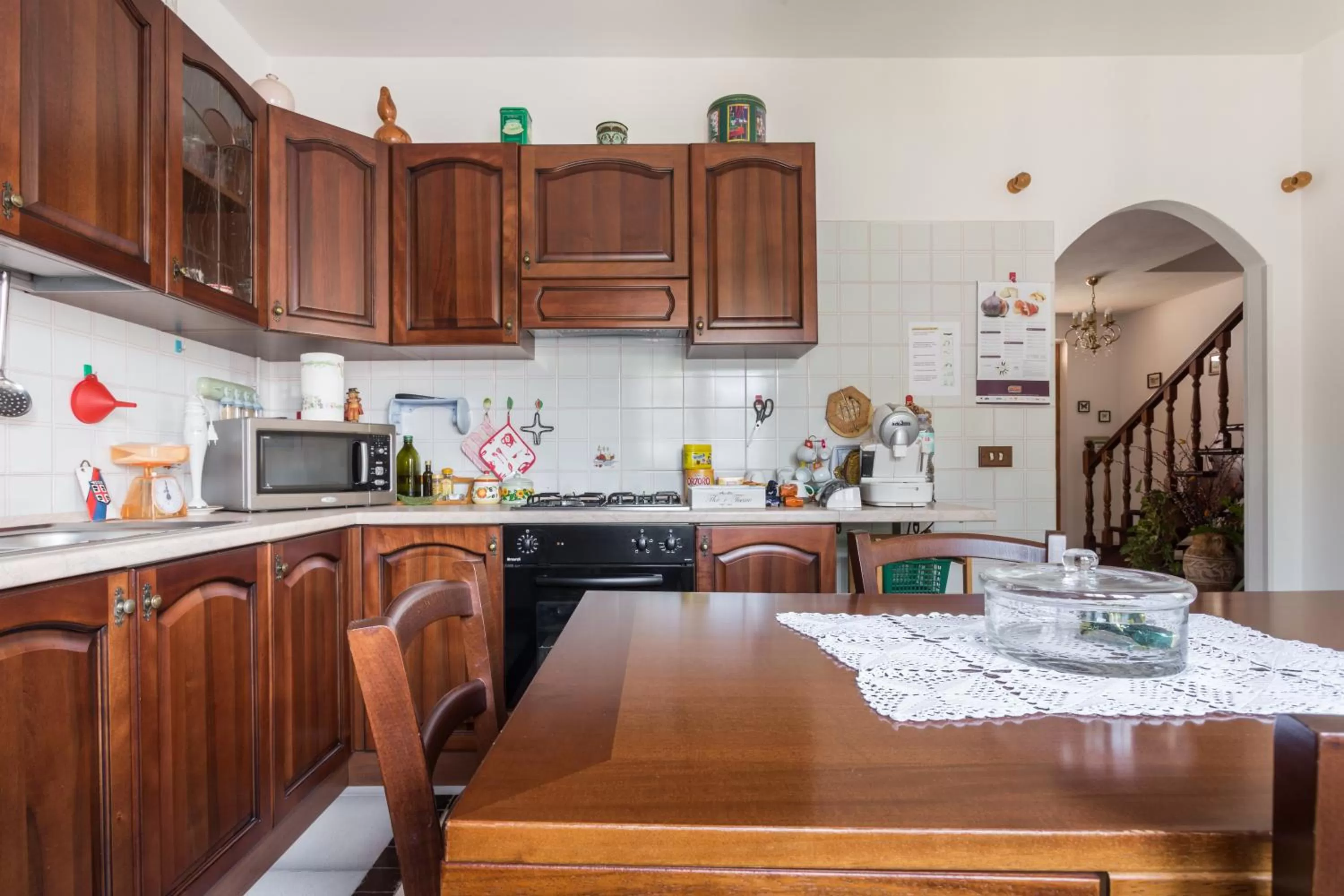 Communal kitchen in B&B Il Mirto