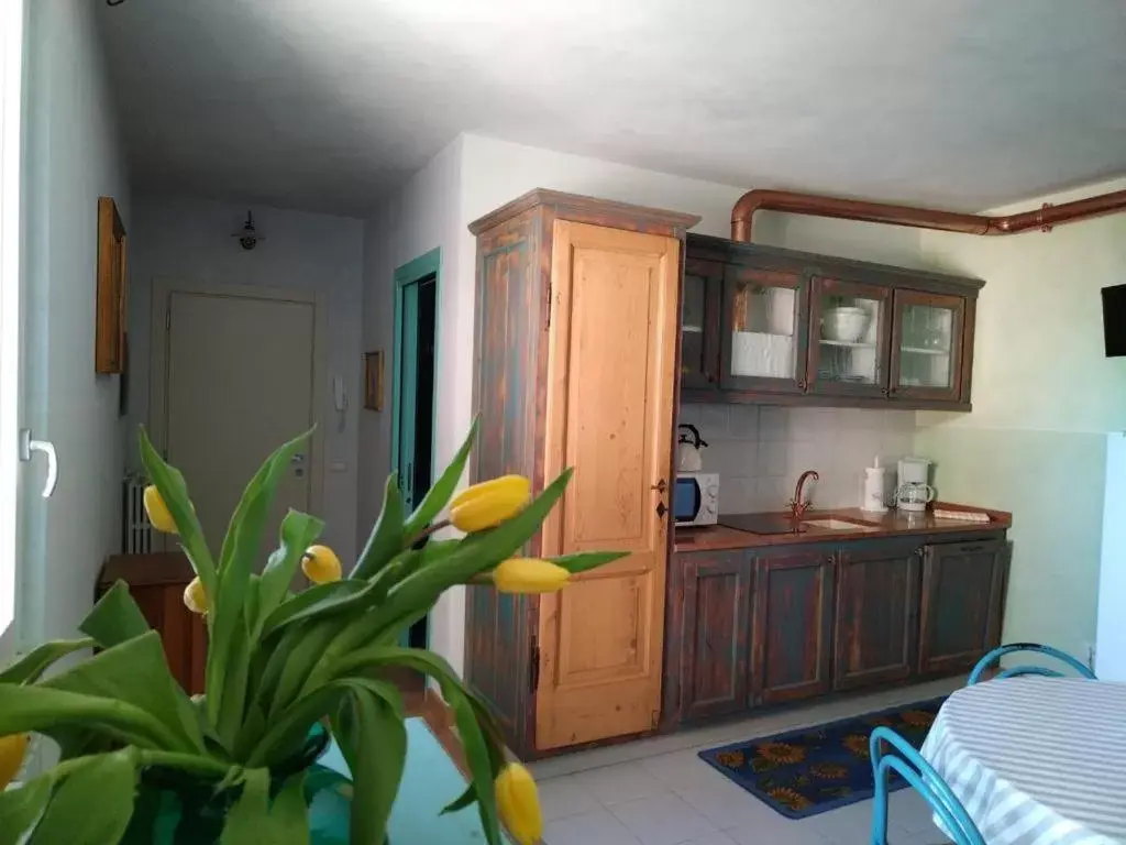 Kitchen/Kitchenette in Borgo al Sole by Garda Facilities