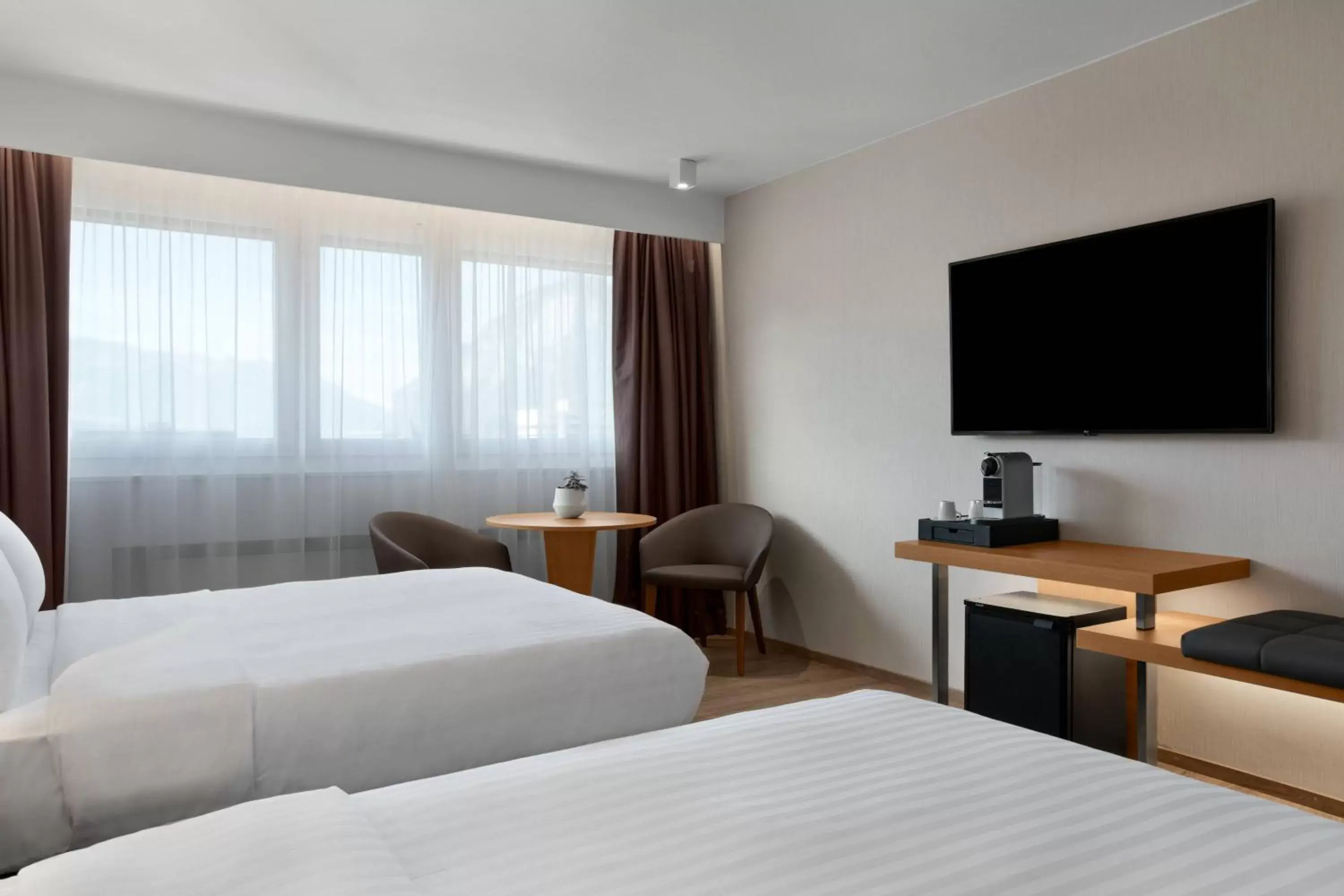 Photo of the whole room, Bed in AC Hotel by Marriott Innsbruck