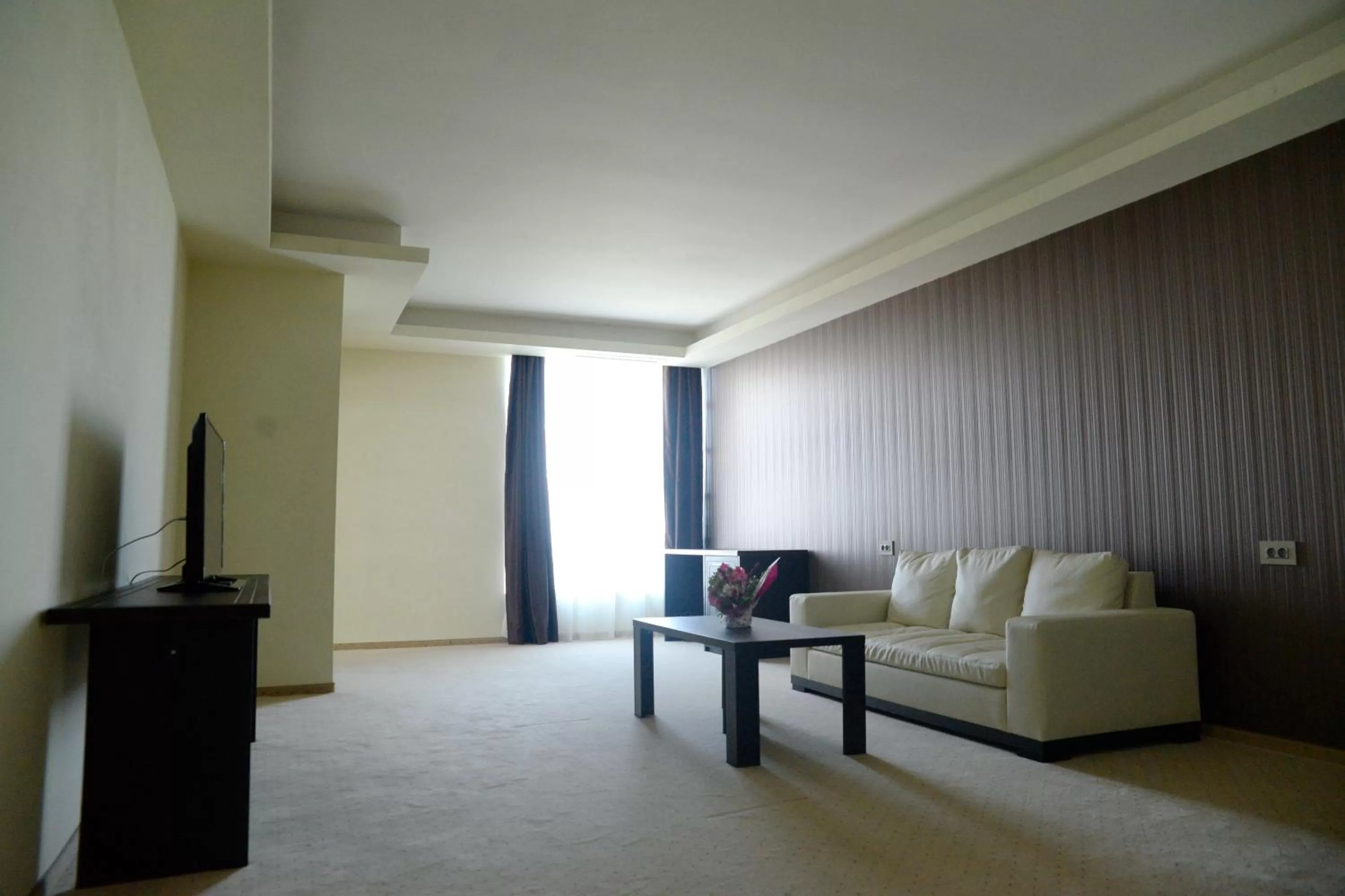 Living room in Ramada by Wyndham Constanta