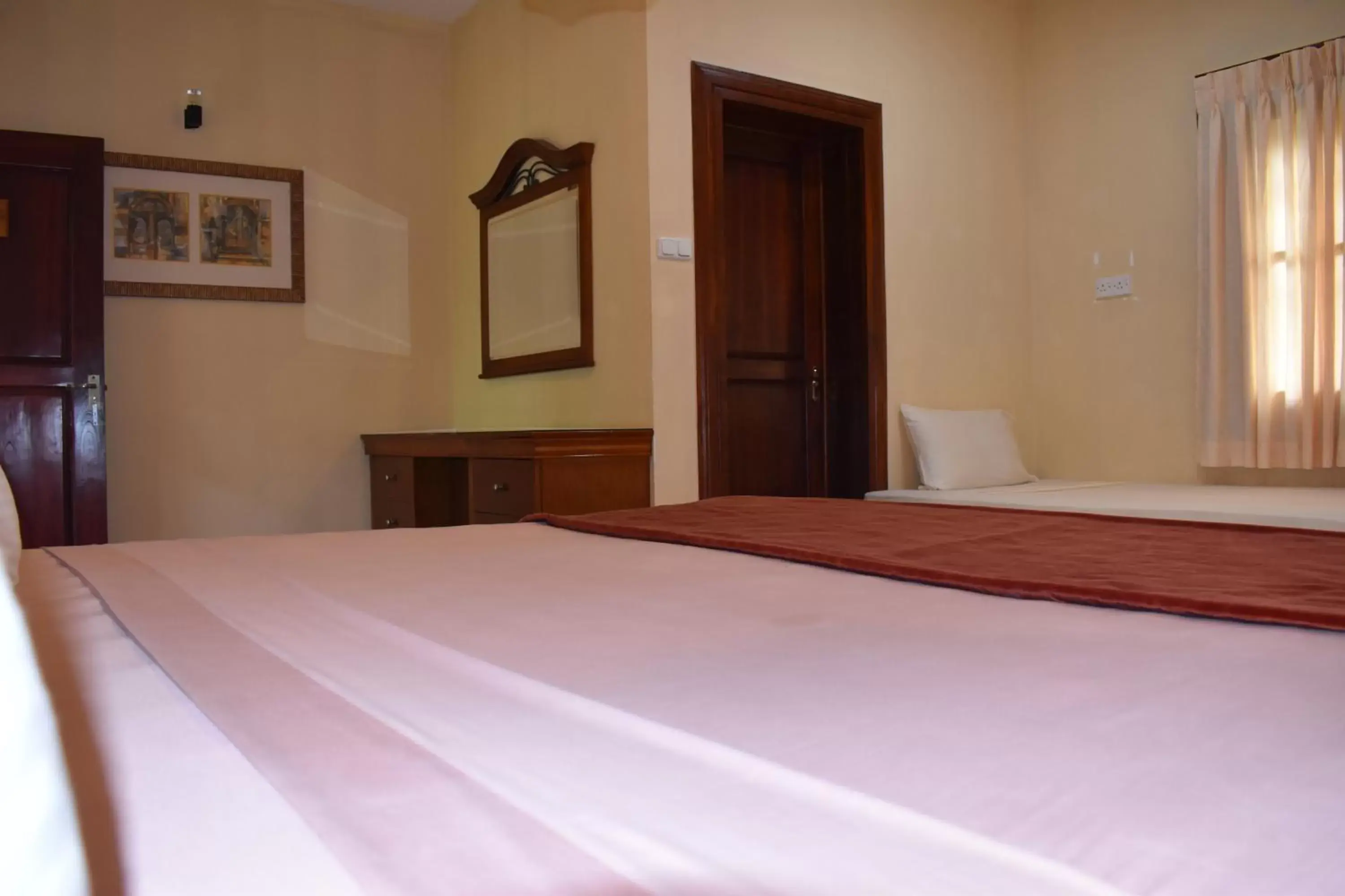 Triple Room with Pool View in Hotel 4 U Saliya Garden Triple Room with Pool View in Hotel 4 U Saliya Garden