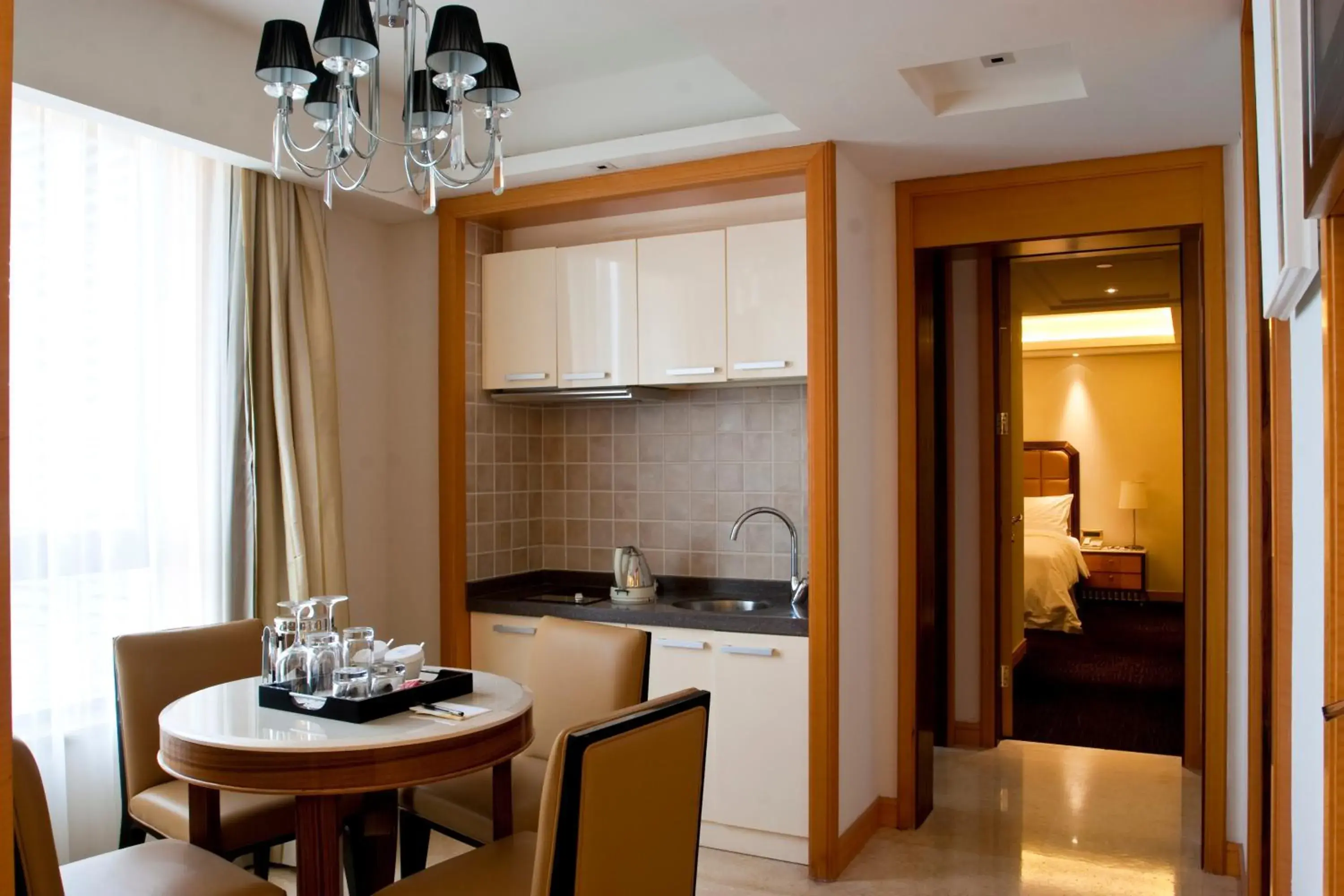 Photo of the whole room, Kitchen/Kitchenette in Wealthy Hotel Suzhou