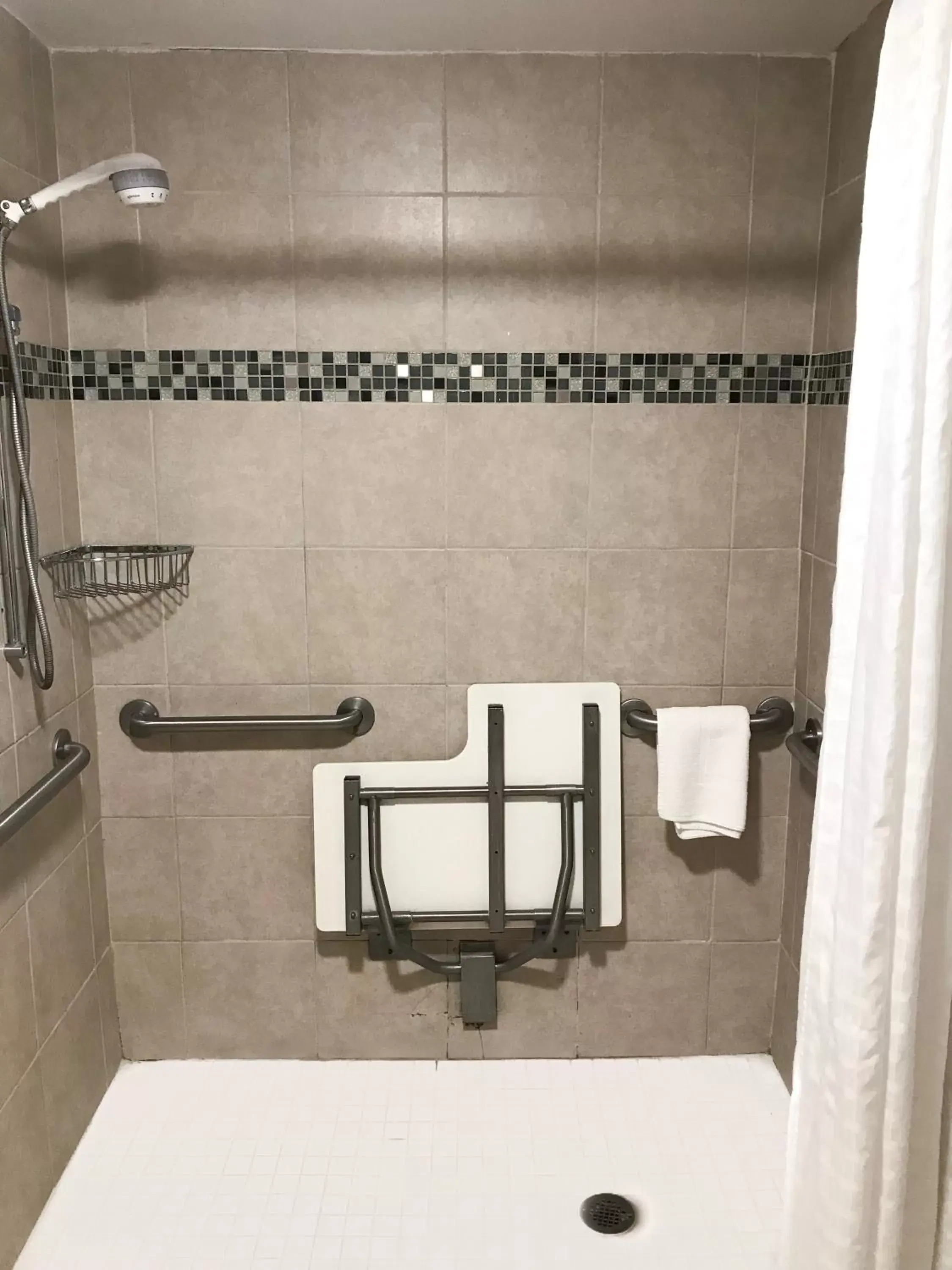 Bathroom in Ramada by Wyndham Suites Orlando Airport