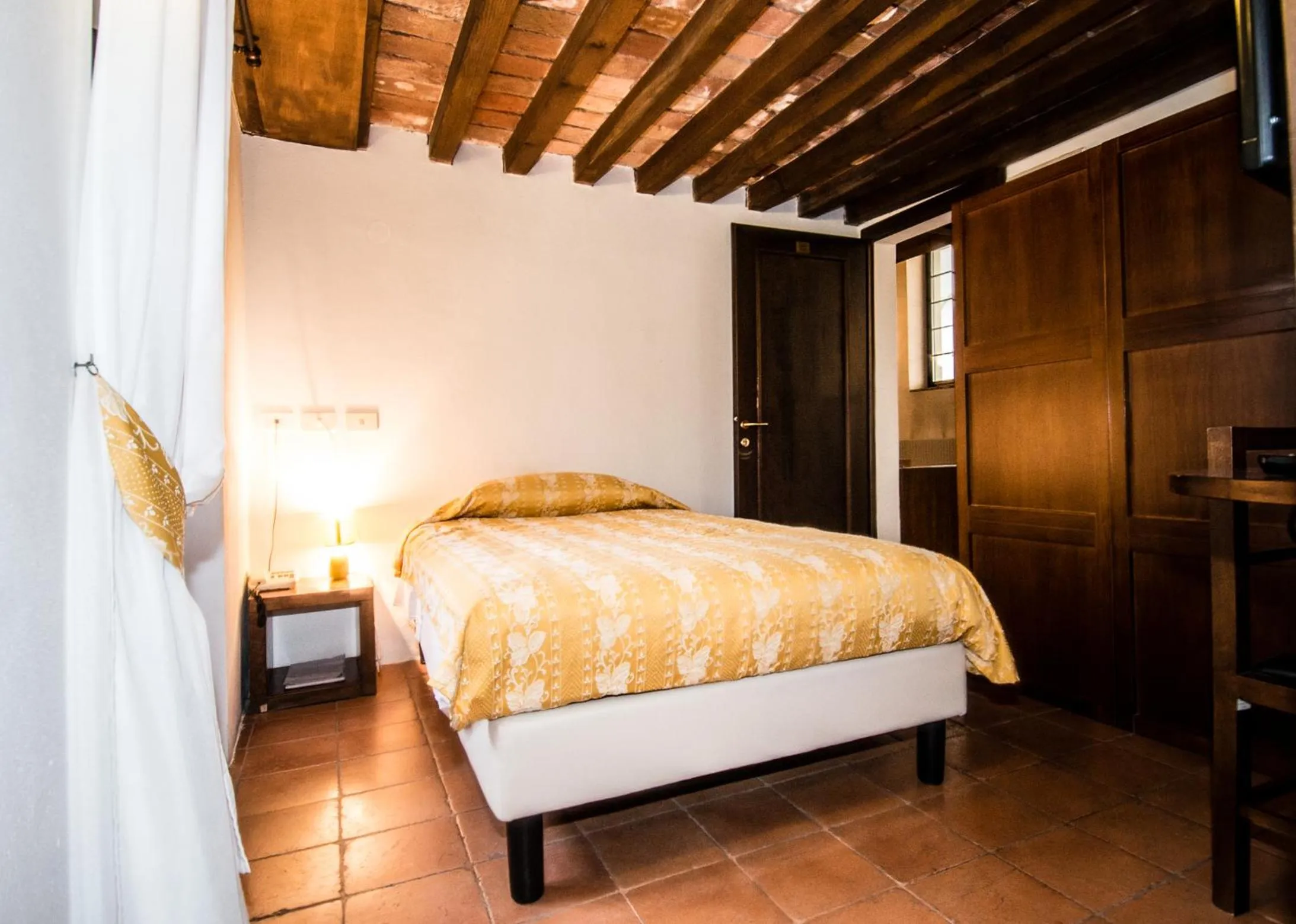 Bed in Relais Fontevivo
