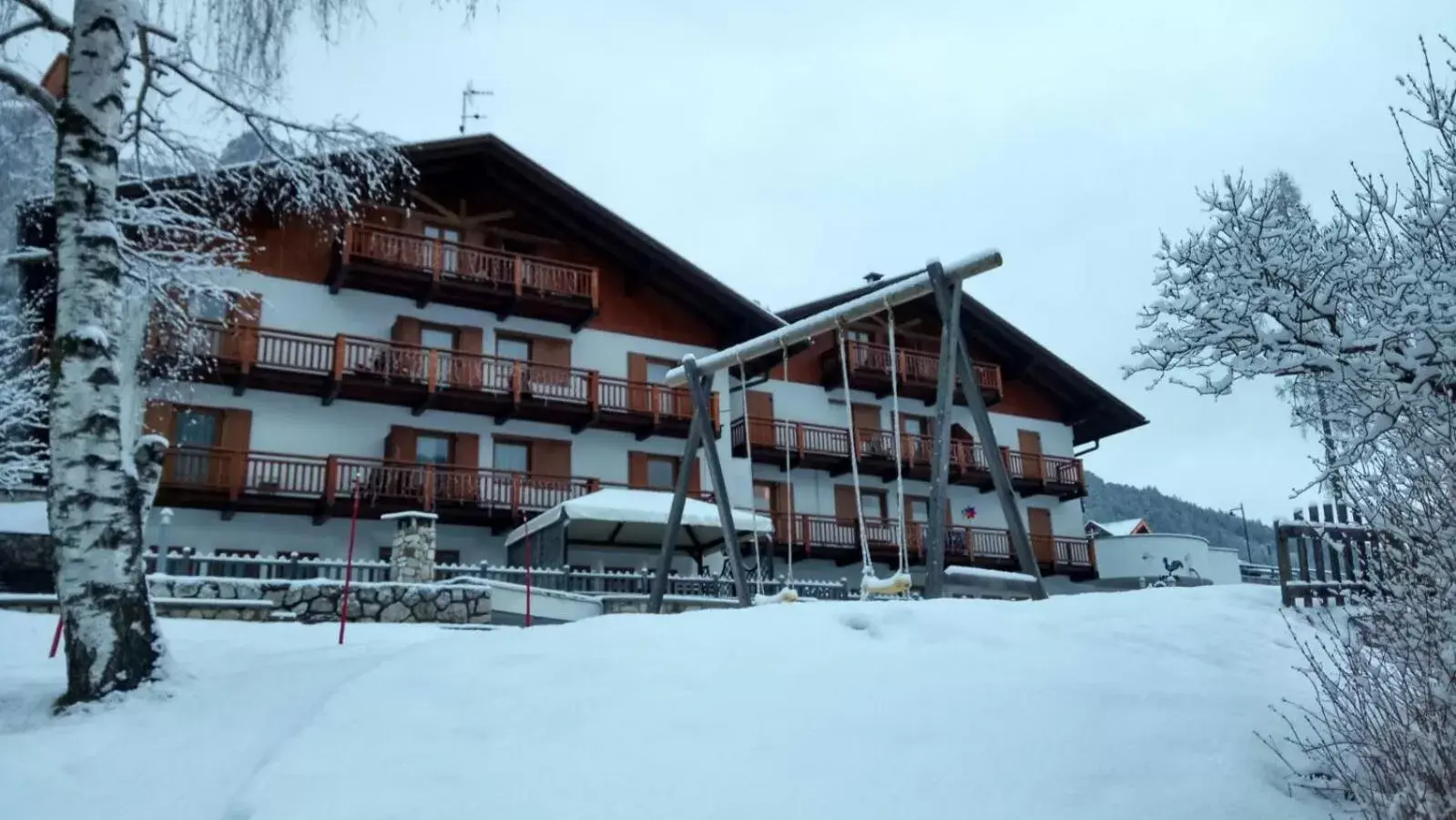 Property building, Winter in FORESTO - holiday apartments