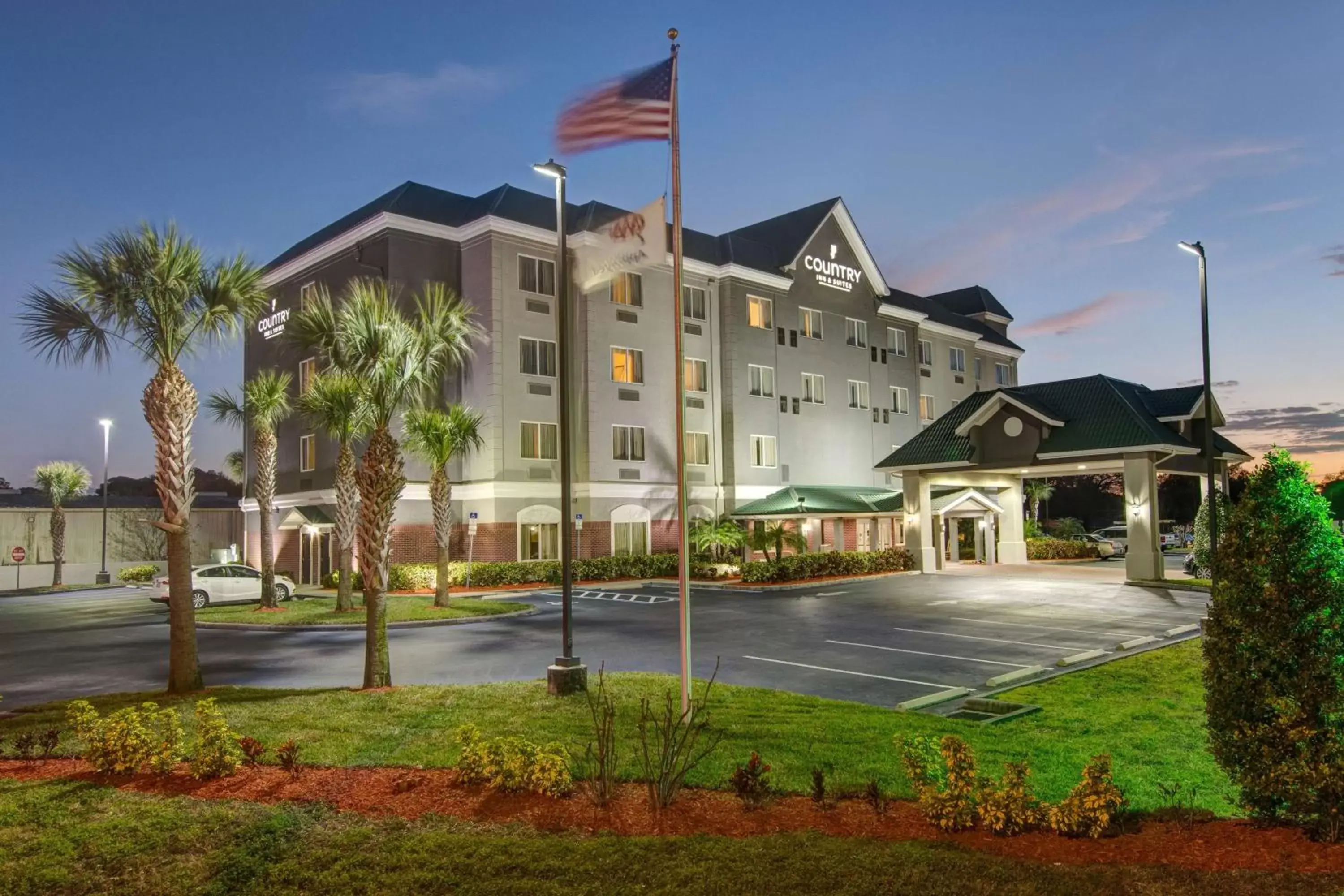 Property Building in Country Inn & Suites by Radisson, St. Petersburg - Clearwater, FL