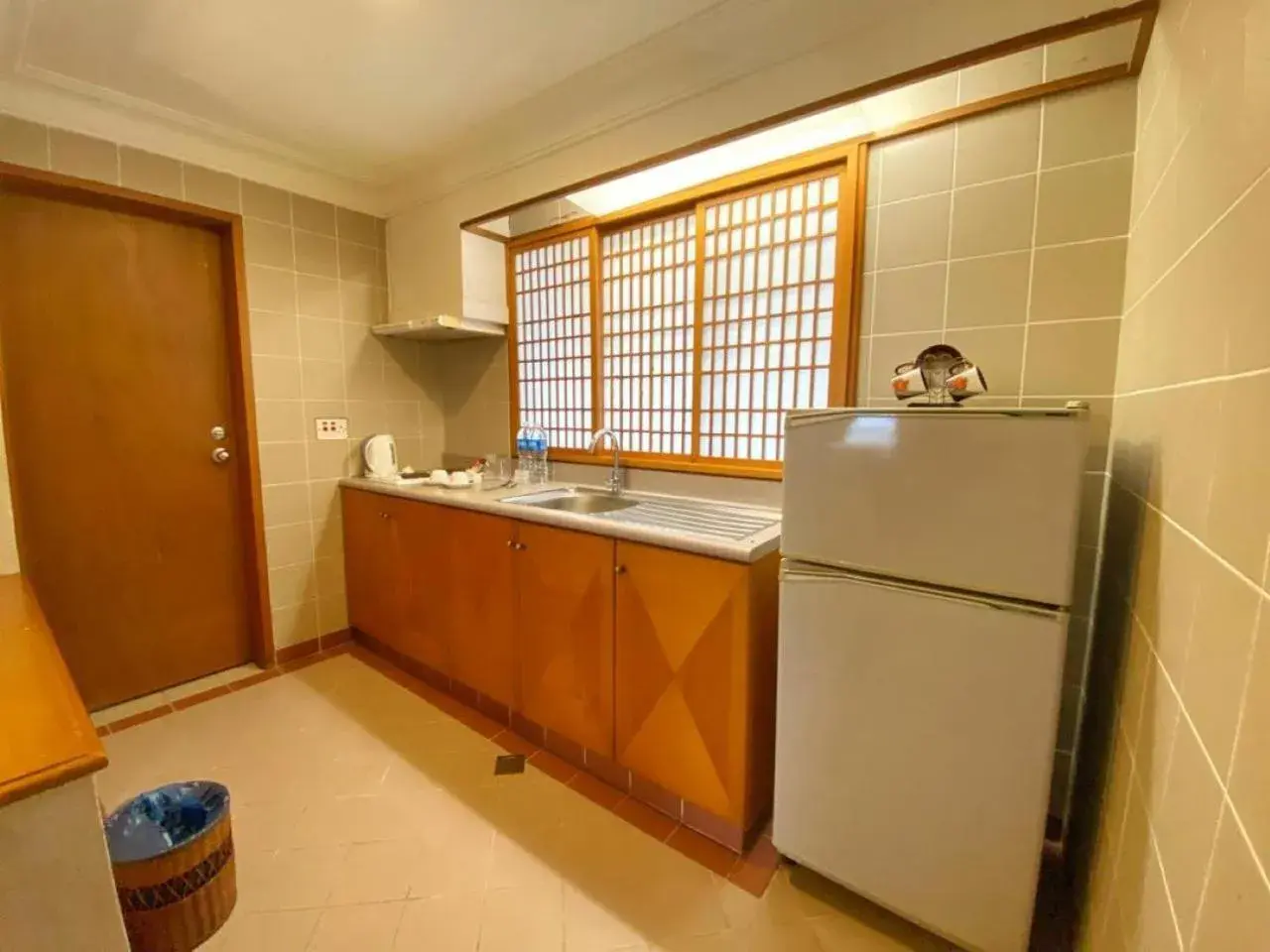 Kitchen or kitchenette, Kitchen/Kitchenette in Tiara Labuan Hotel