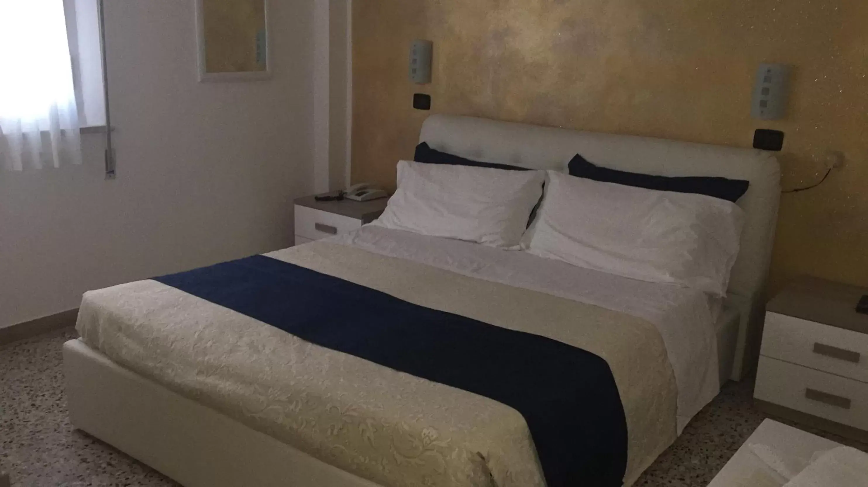 Bed in Dea Della Salute Hotel