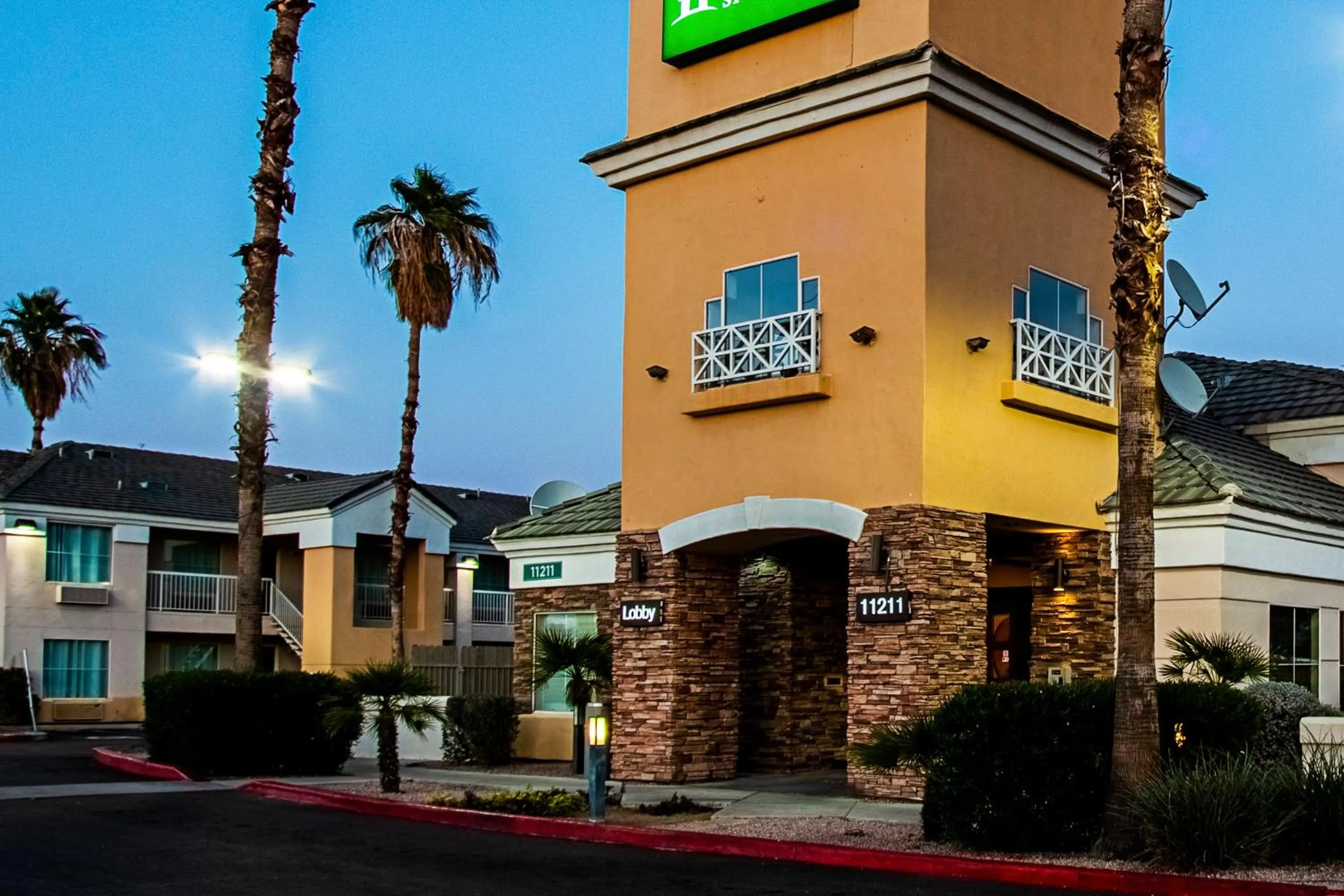 Property building in HomeTowne Studios by Red Roof Phoenix - Black Canyon Highway