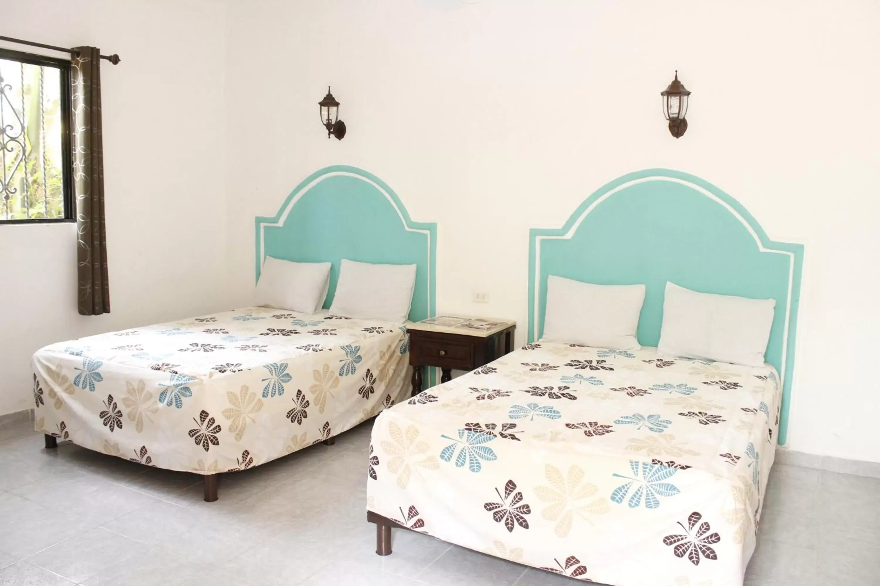 Photo of the whole room, Bed in Posada Ya´ax Ich