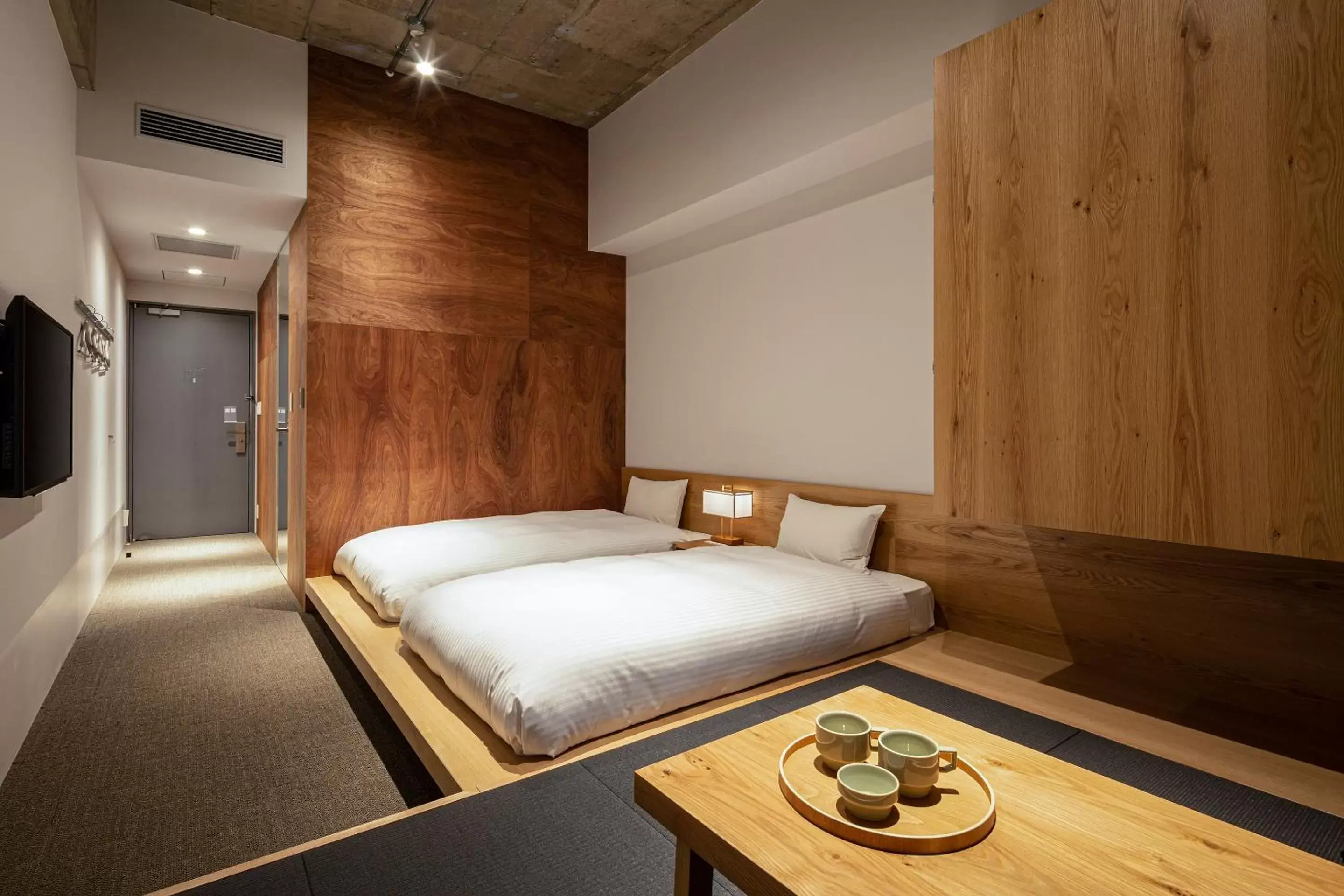 Photo of the whole room, Bed in TSUGU Kyoto Sanjo by THE SHARE HOTELS