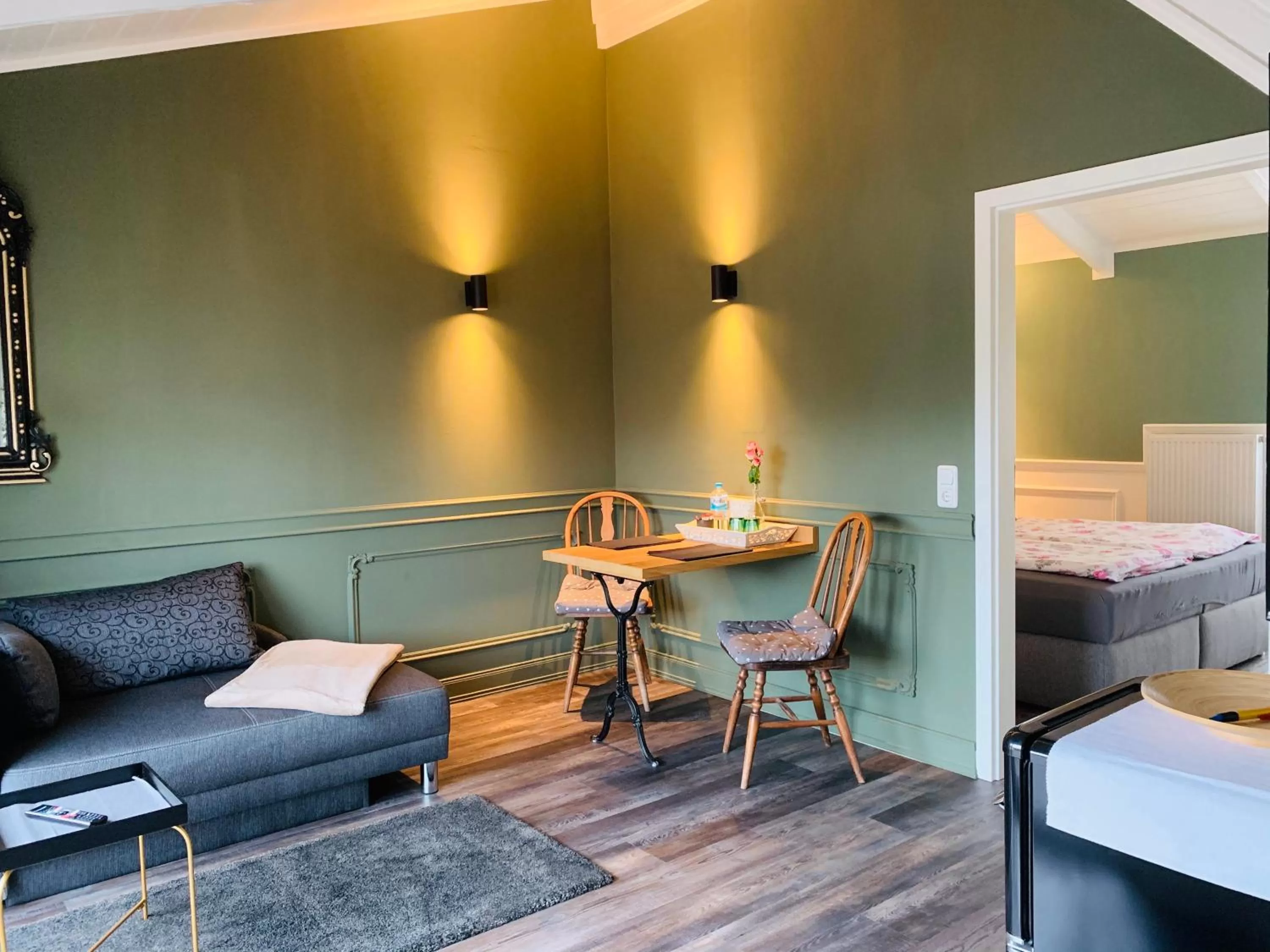 Living room, Bed in Rosenhof-Lodge